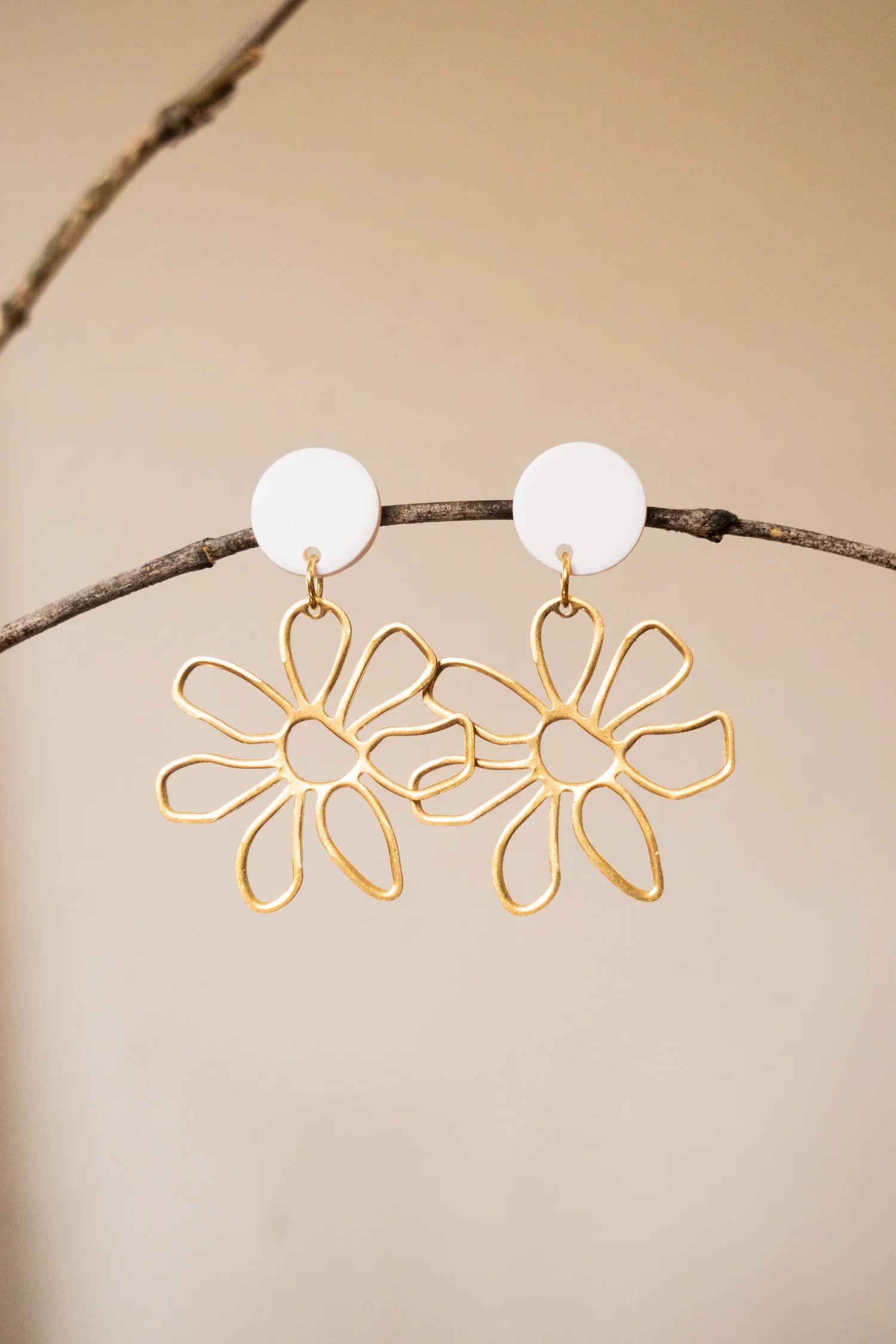 earrings that give back