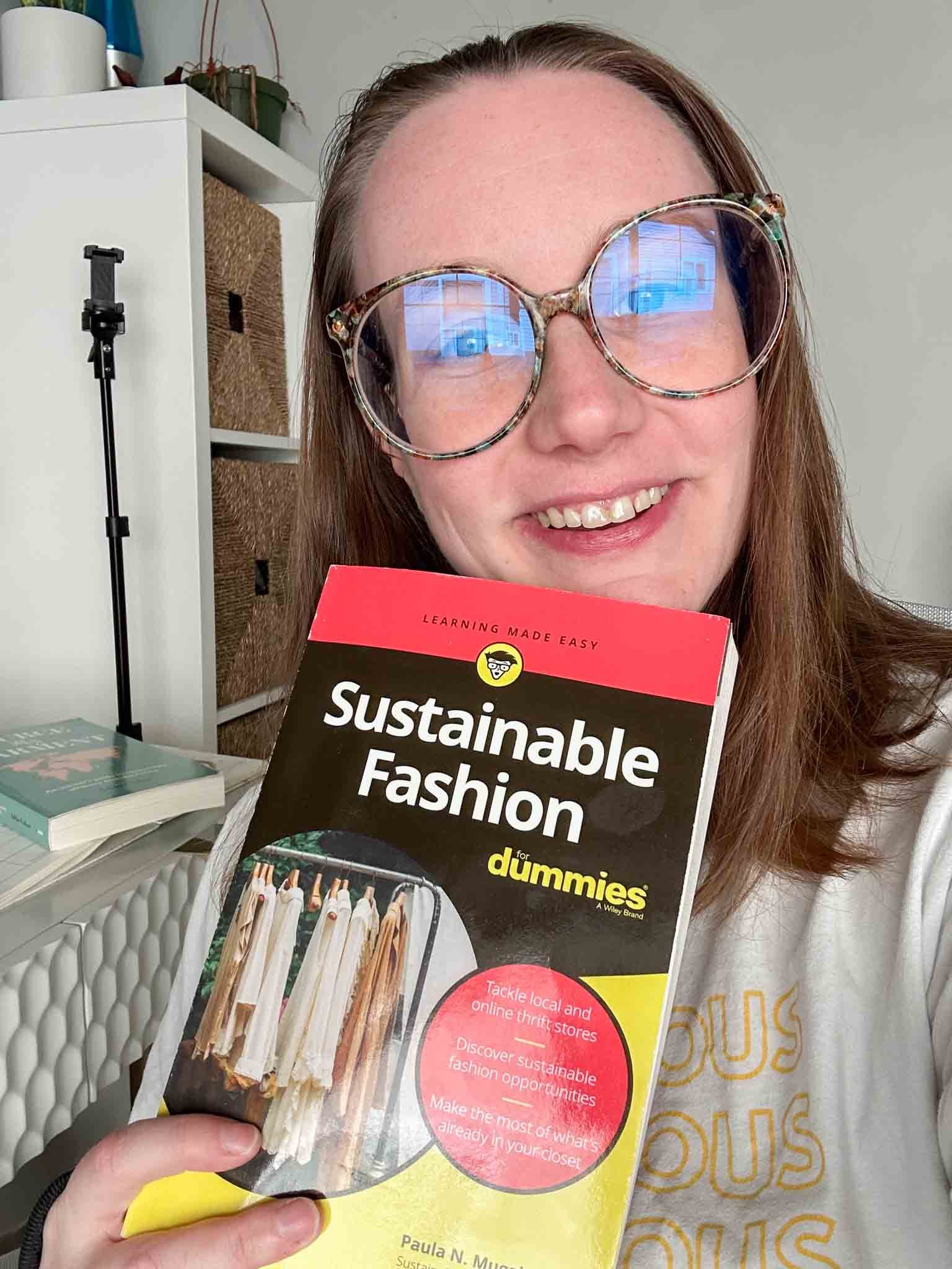 emily reading sustainable fashion for dummies book