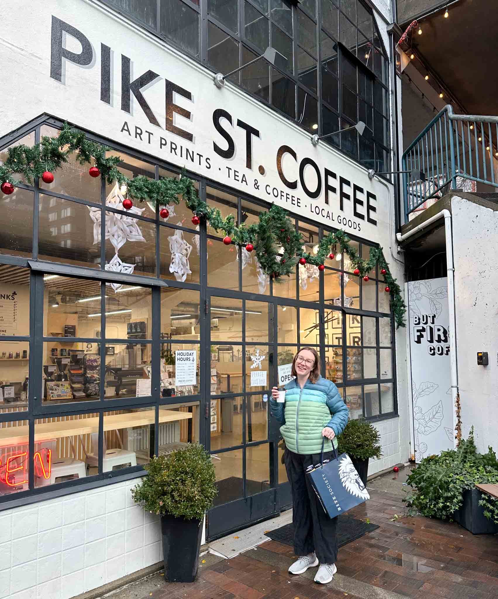 emily in front of coffee shop in seattle