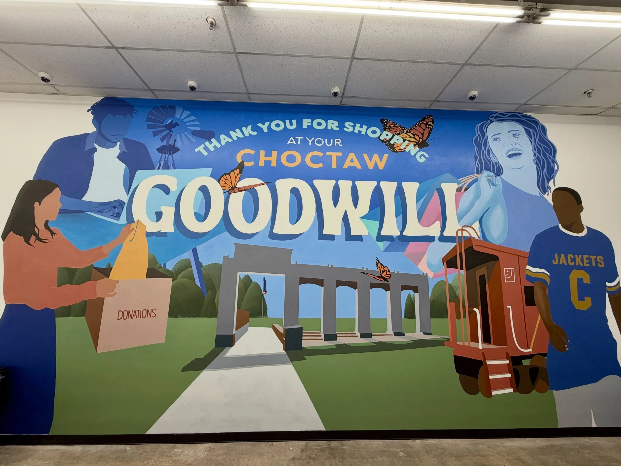 Come celebrate the Grand opening of @okgoodwill in Choctaw this morning!! 🚂 @daneheins and I designed and painted this mural for Goodwill within a week while also juggling other murals. What a whirlwind of a time and we couldn&rsquo;t have done it w