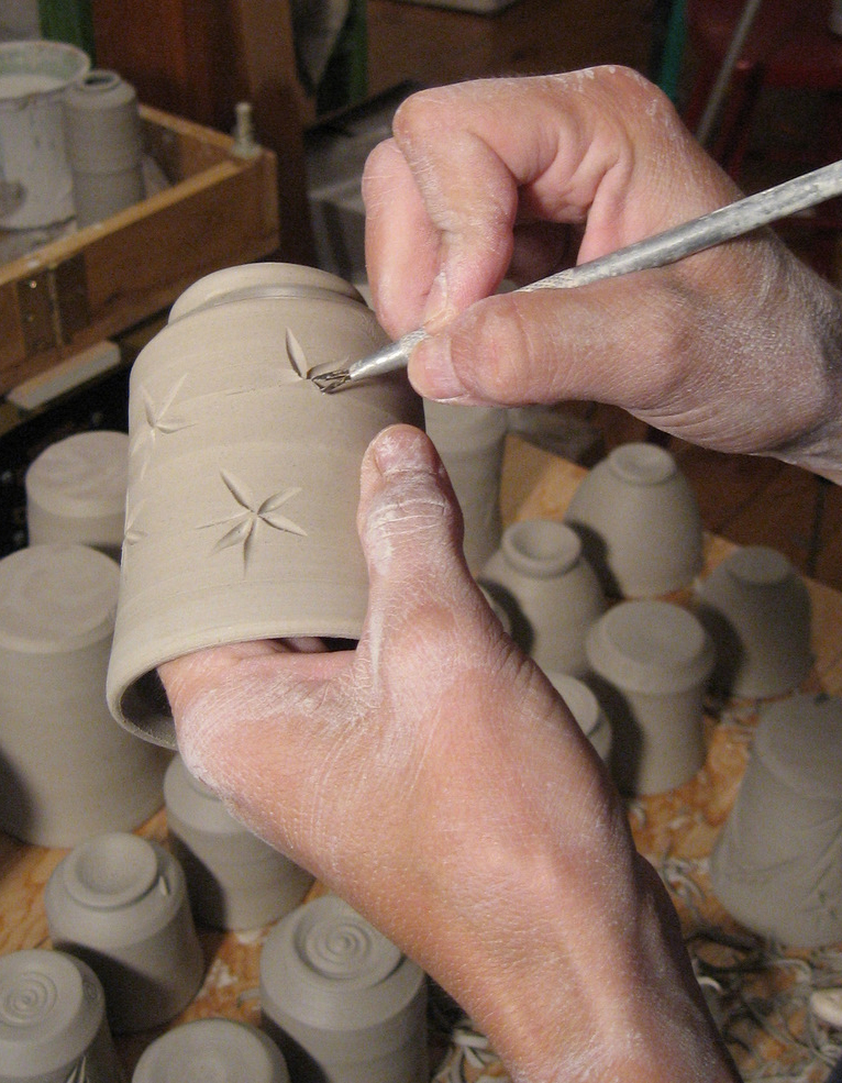 Amy_Clark_Ocean_Fire_Pottery_carving.jpg