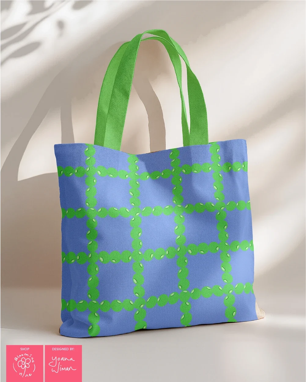 Canvas market tote in green and pastel blue fruit check pattern.