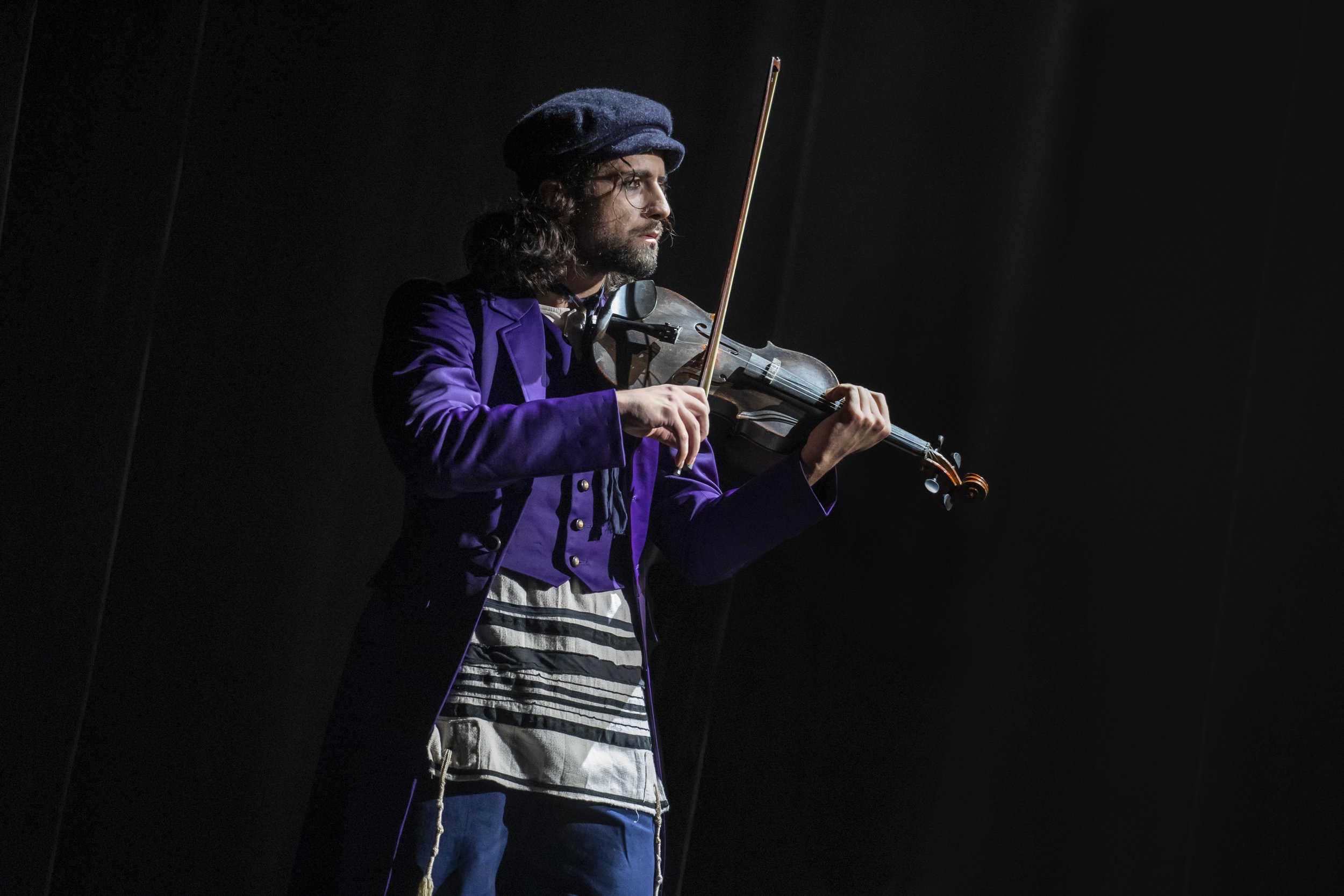 Ali Arian Molaei (The Fiddler) and the Company of the North American Tour of FIDDLER ON THE ROOF - Photo by Joan Marcus (0931r).jpg