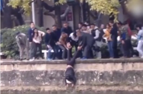 I know it looks like they're dunking him, but it's the other way around, honest