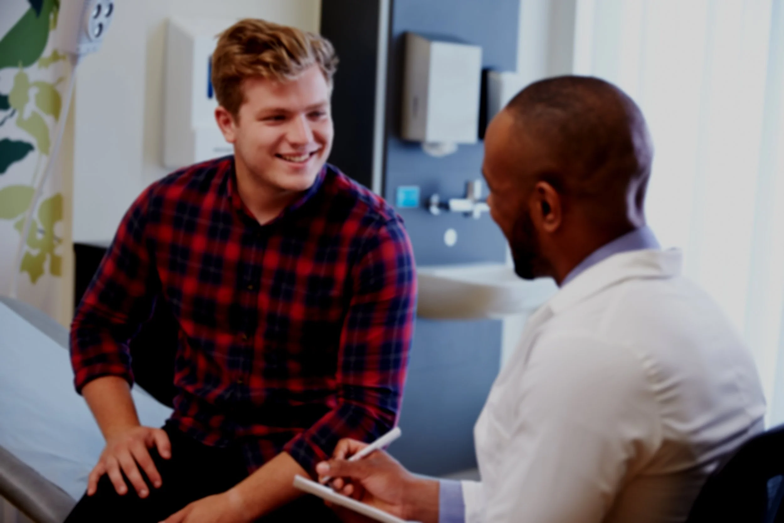 stock-photo-doctor-with-patient.jpg