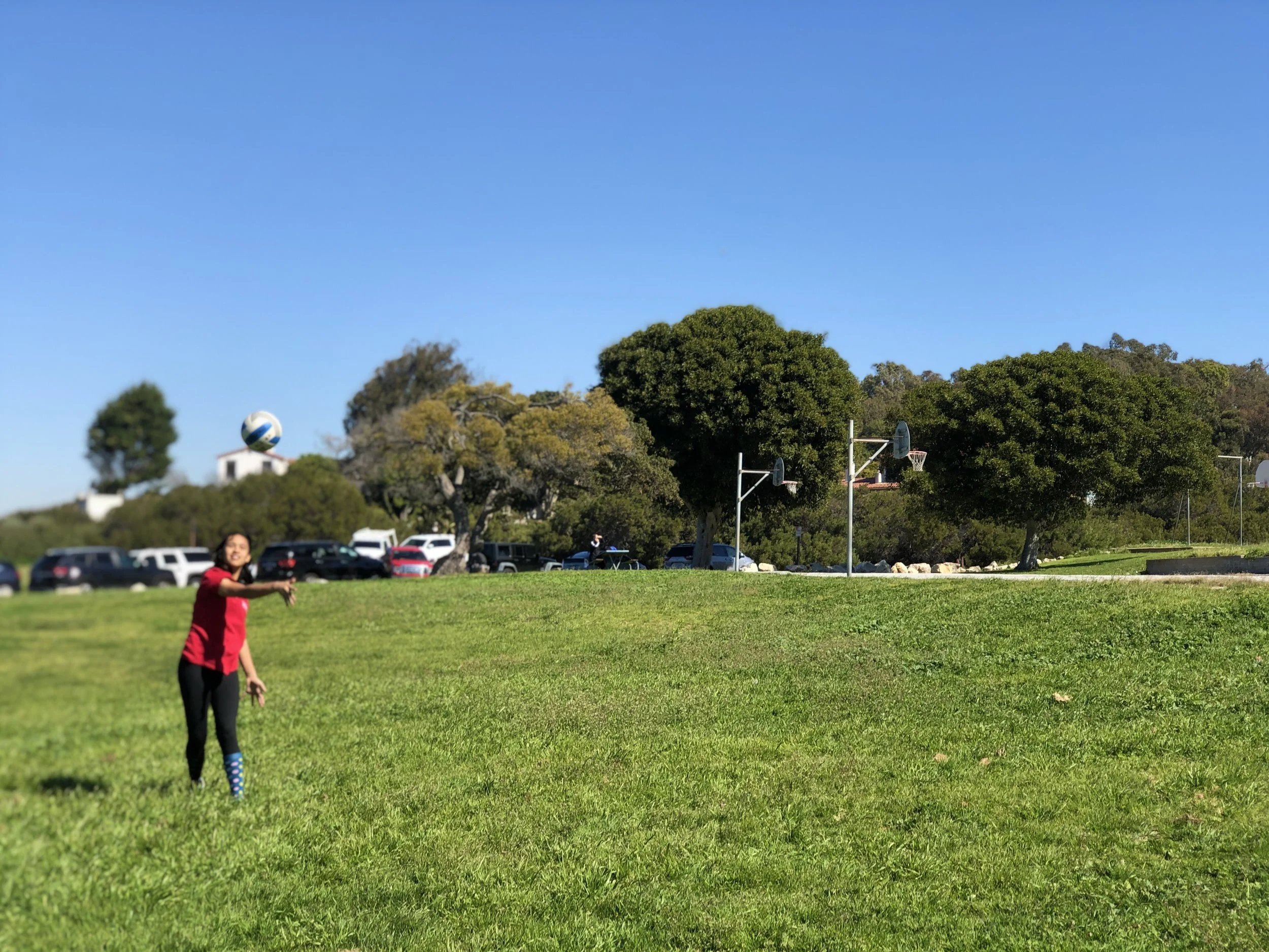 The awesome niece playing outside under the big, beautiful blue sky…