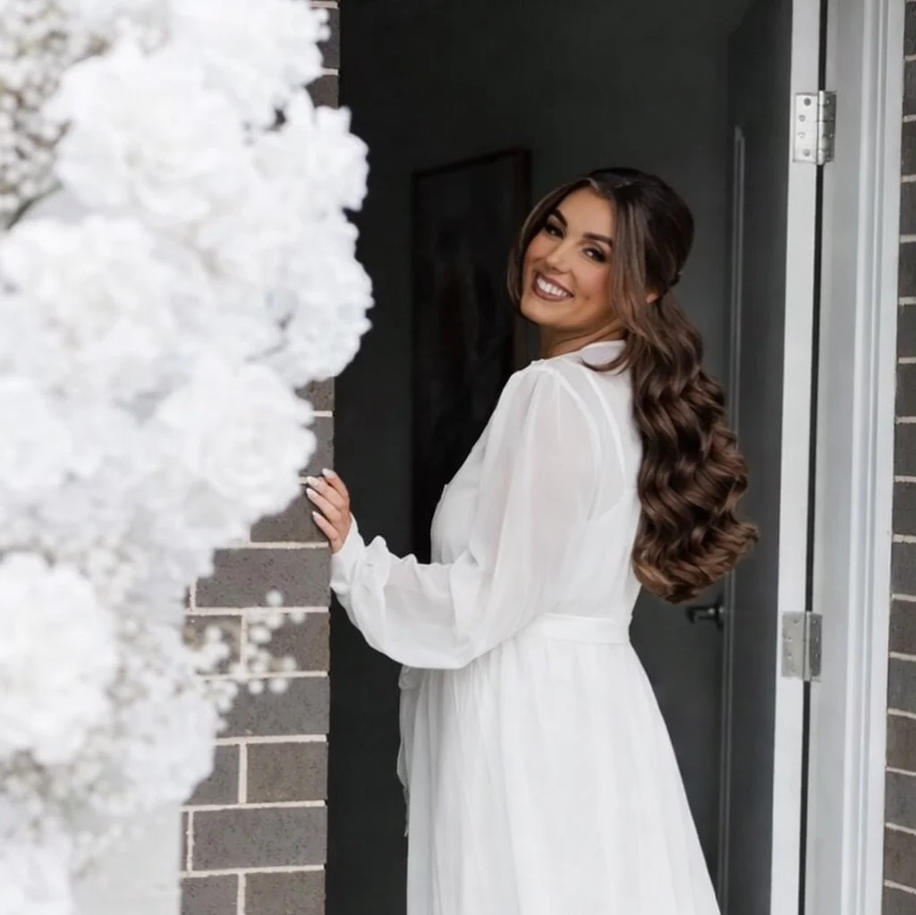 This is the moment you step out and everything feels real 🤍

Your hair shouldn&rsquo;t overpower you.
It should frame you. Move with you. Elevate you.

If you&rsquo;re a 2026 bride wanting that soft, refined, luxury finish, my calendar is now open.
