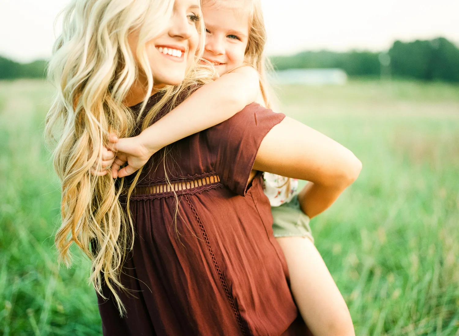 lifestyle-family-photographer-field-sunset-raleigh-holly-springs