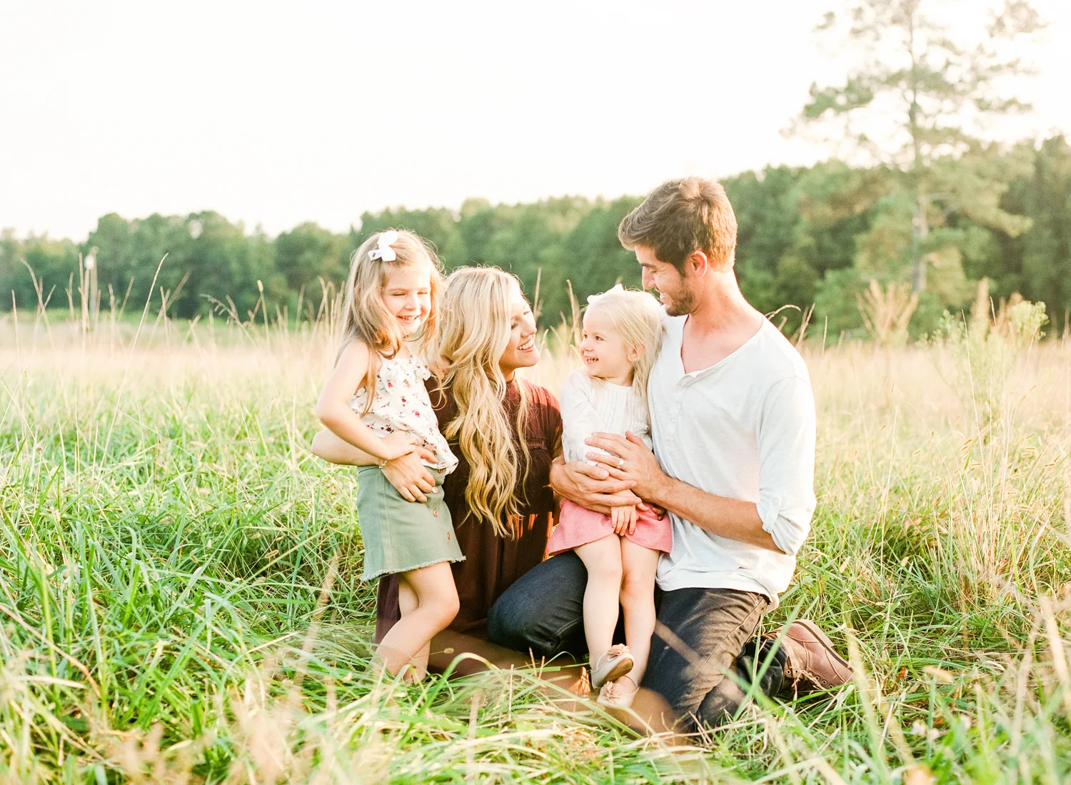 lifestyle-family-photographer-field-sunset-raleigh-holly-springs