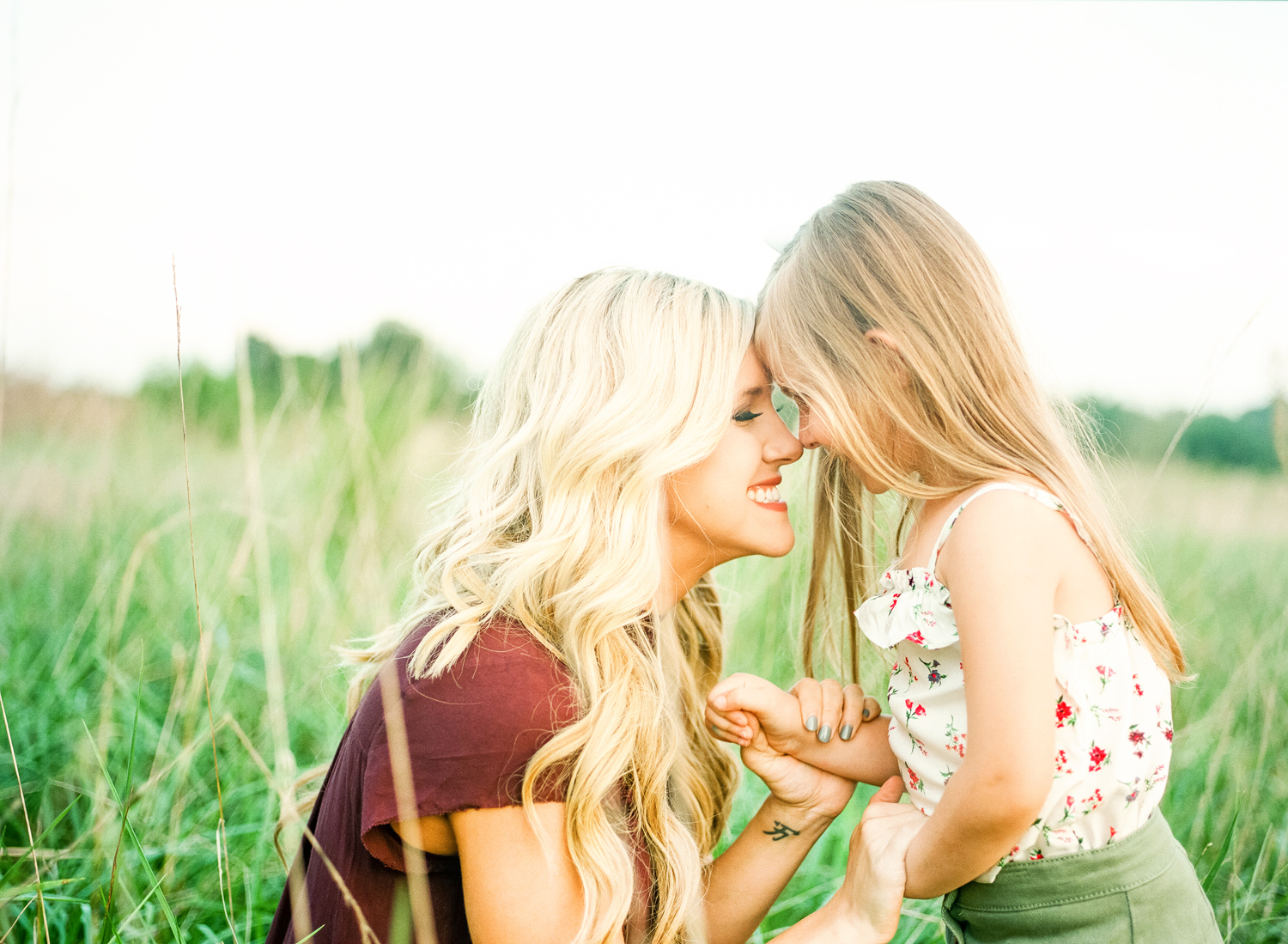 lifestyle-family-photographer-field-sunset-raleigh-holly-springs