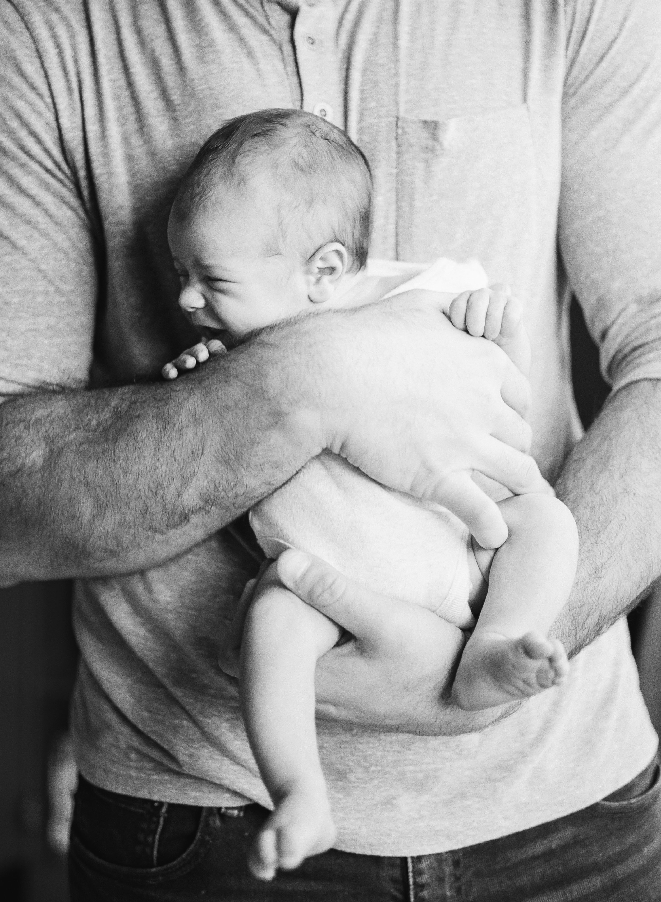 lifestyle-newborn-film-photographer-nursery-raleigh-father