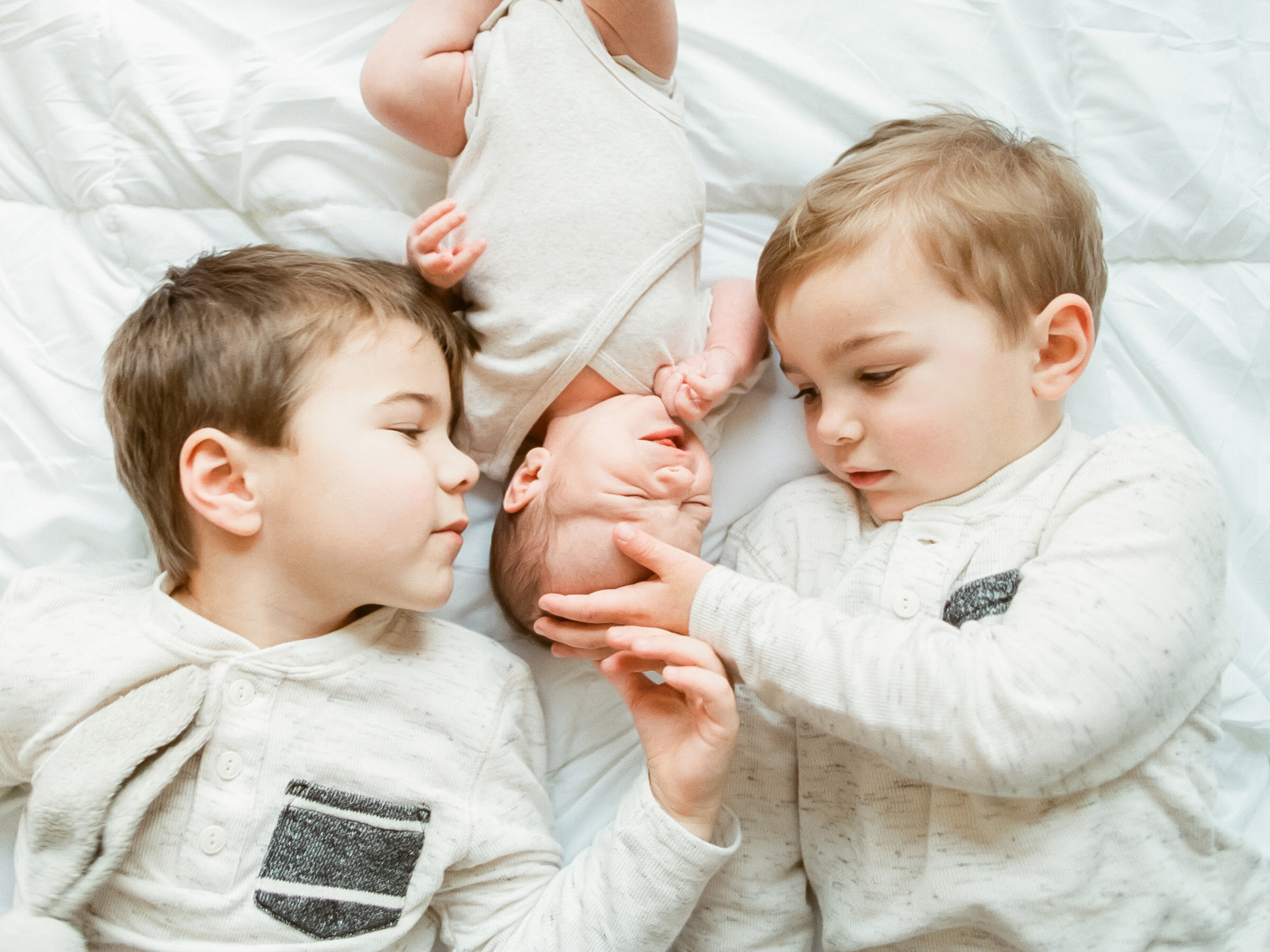 lifestyle-newborn-film-photographer-nursery-raleigh-siblings
