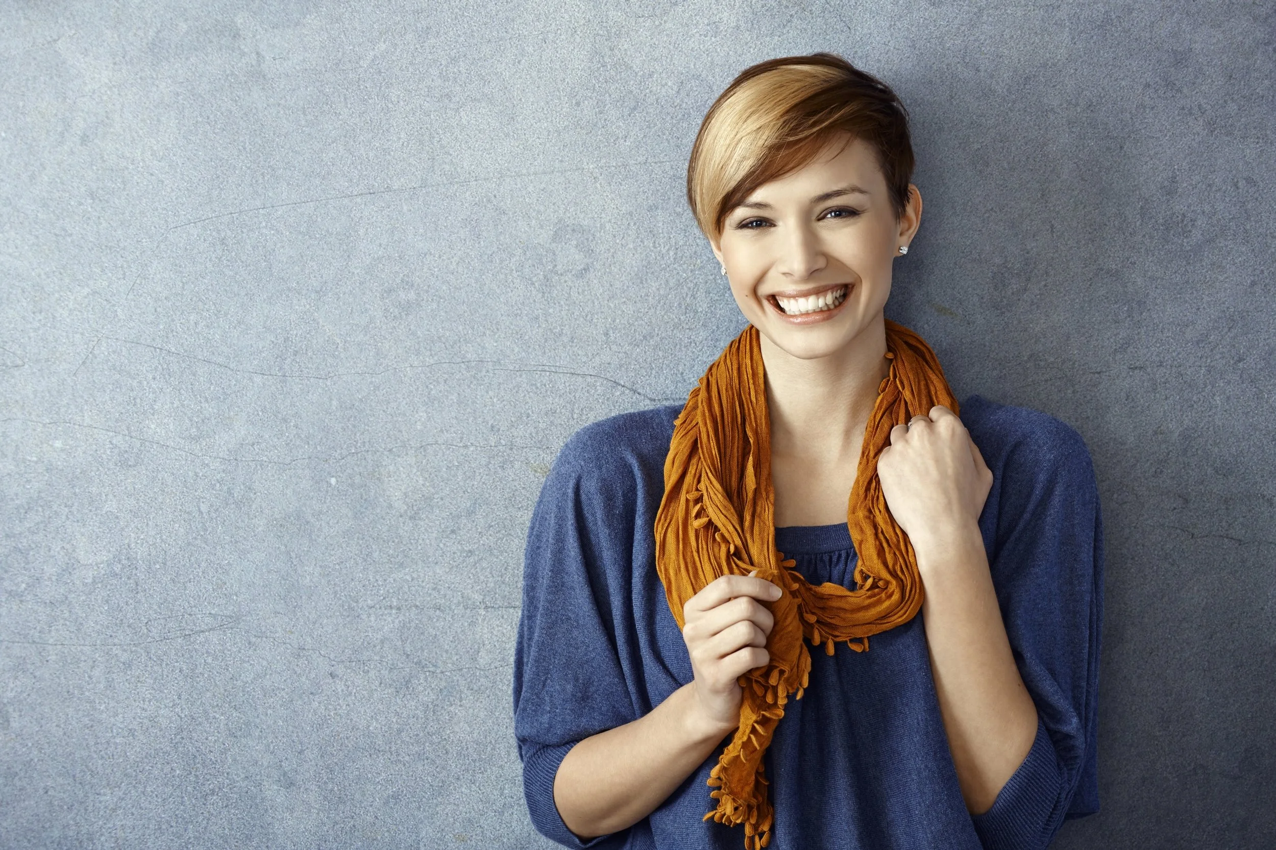 Young woman smiling happily.jpg