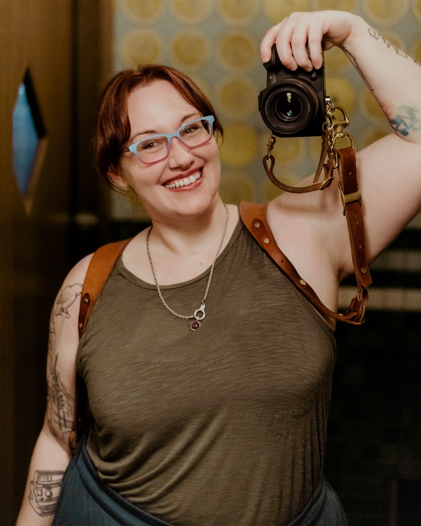 I remember the very first photo I ever took (yes really). My first camera was a polaroid camera (you can see a tattoo of my first camera in this photo!), and it was (and still is) one of the most miraculous inventions I've ever used. I was 8 years ol