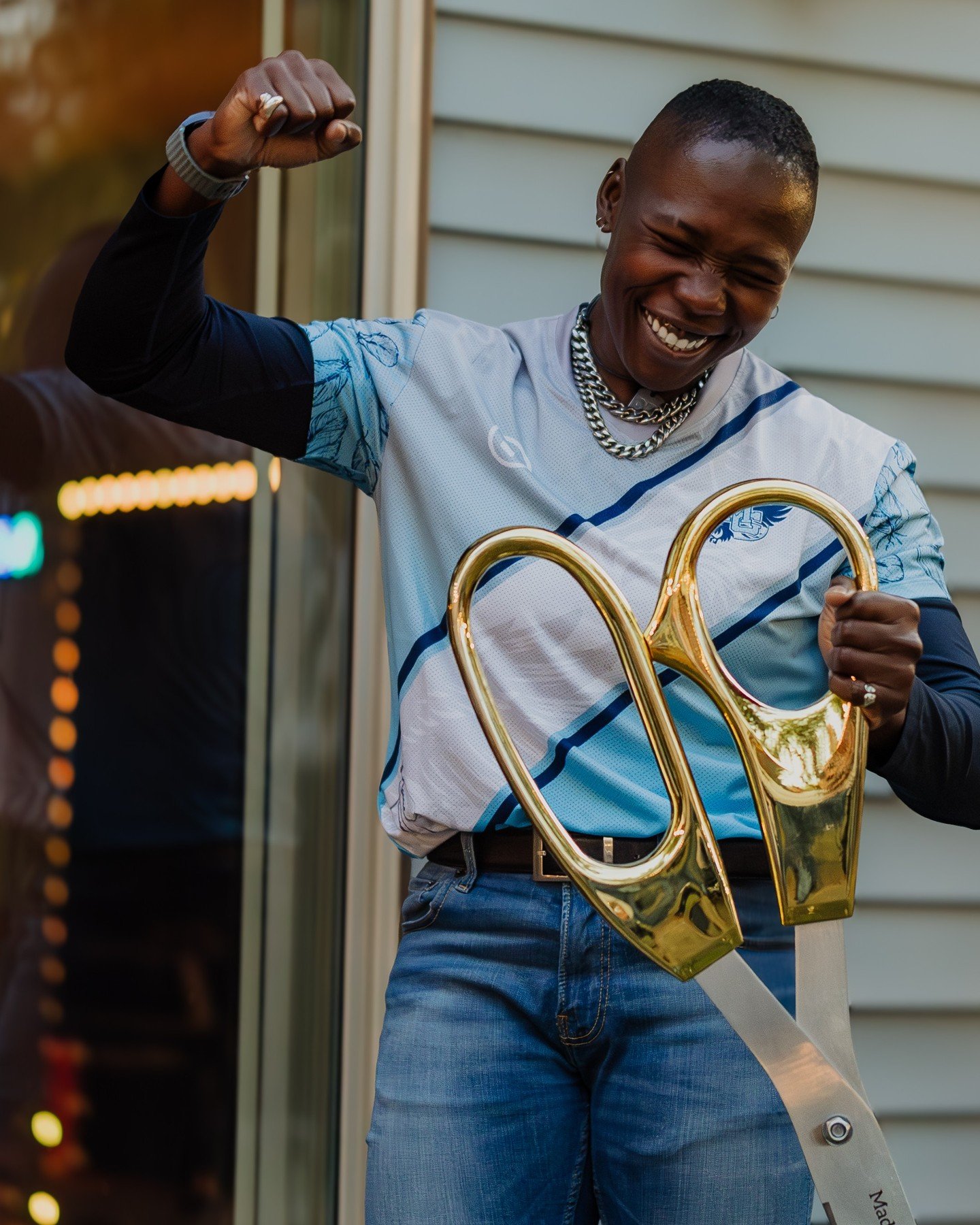 This moment right here, just after Ziggy / @thelifeofzigzag
cut the ribbon on the new @zinovaefoundation Northwood Soccer Clinic is pure joy and magic! 
.
.
.
.
.
[Image Description: A Black woman with short buzzed hair wearing a black long-sleeve sh