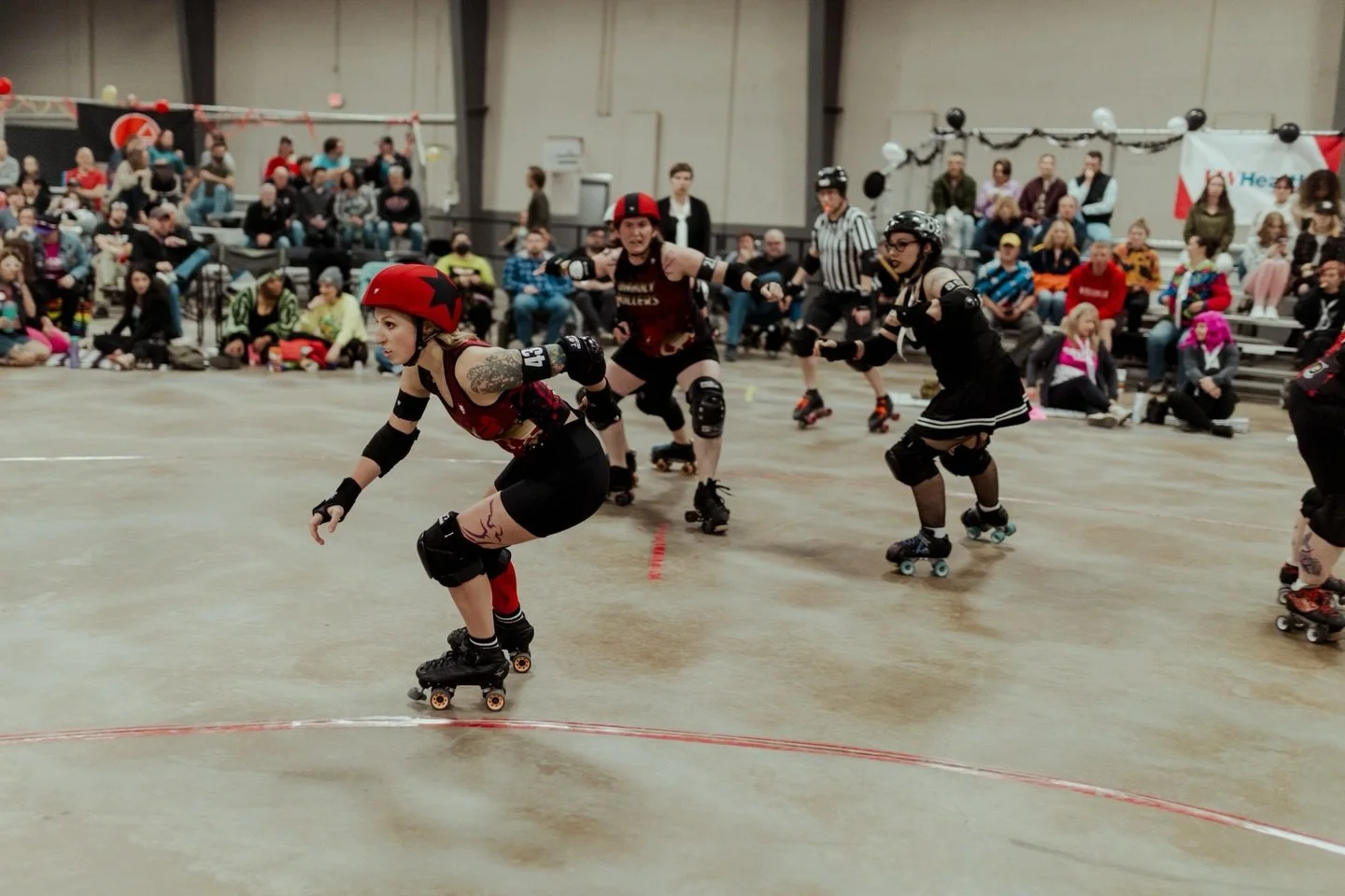 Want to see more photos from the Roller Derby bout on 11/15? Head to the link in our bio! 
.
.
.
.
.
[Image Description: A series of images of a roller derby bout, some in color, some in black &amp; white.]