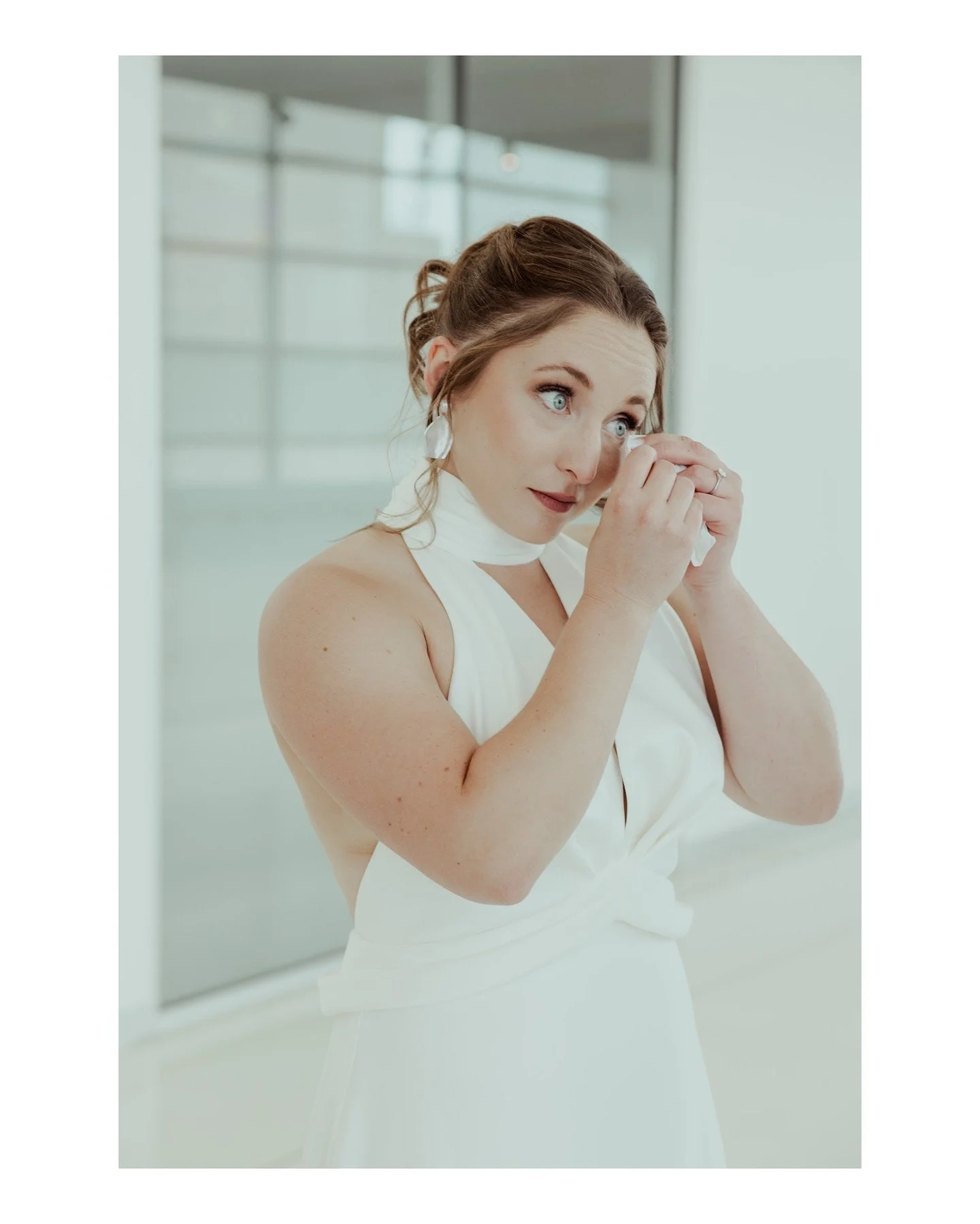 When I cry, I look like a gremlin, but that is NOT the case for Kait, who looks stunning, even when she's crying after doing her first look with her now wife, Hanna. 🥹
.
.
.
.
.
.
𝗪𝗲𝗱𝗱𝗶𝗻𝗴 𝗩𝗲𝗻𝗱𝗼𝗿𝘀: 
 - Ceremony Venue: @madisonpubliclibr