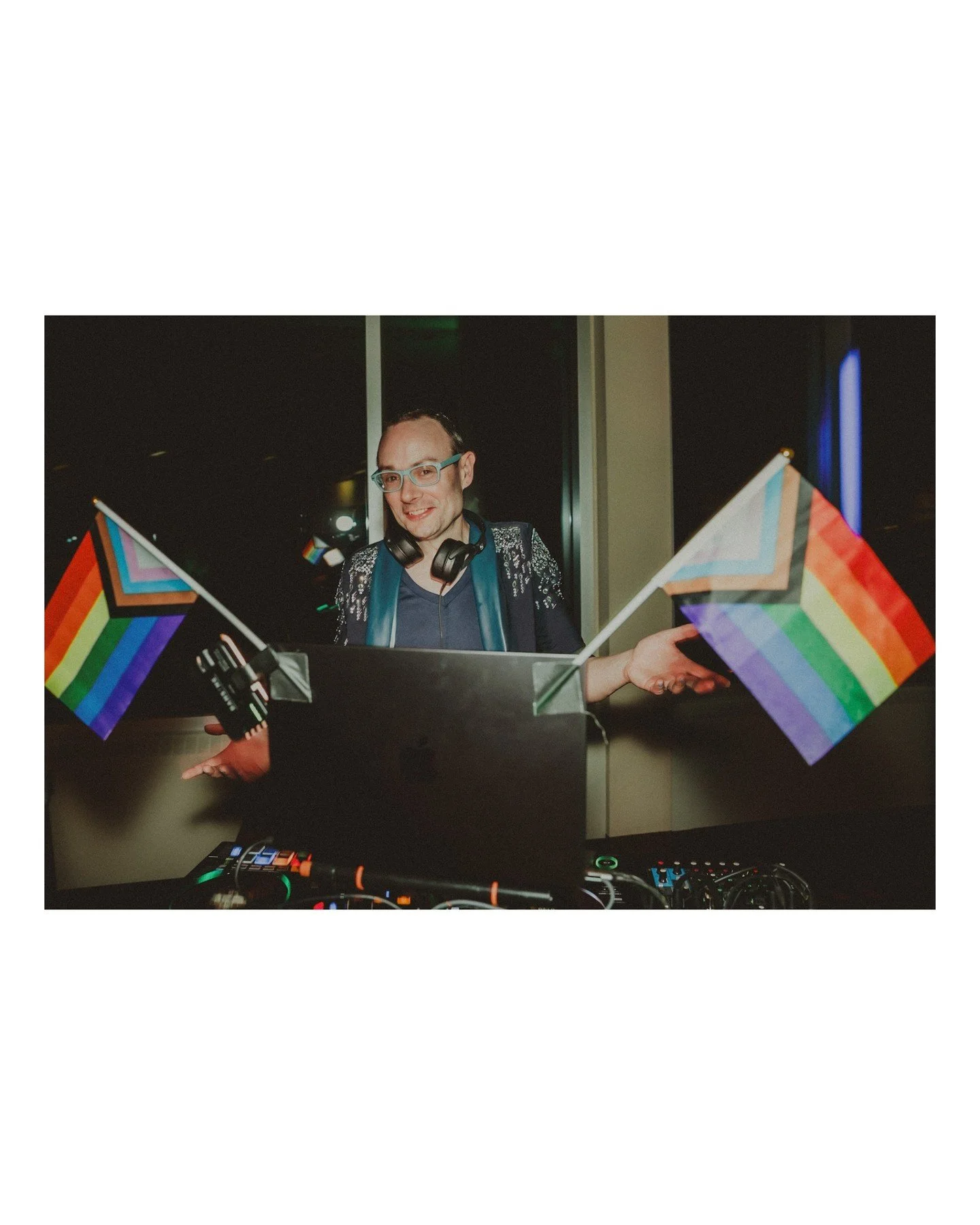 We LOVE wedding vendors who also support queer and trans clients with as much enthusiasm as we do! It was wonderful to work with you @flux.vj! 
.
.
.
.
.
. 
 - Camera Gear: 
 - Canon: @canonusa
 - DJ: 
 - @flux.vj
[Image Description: A white person w