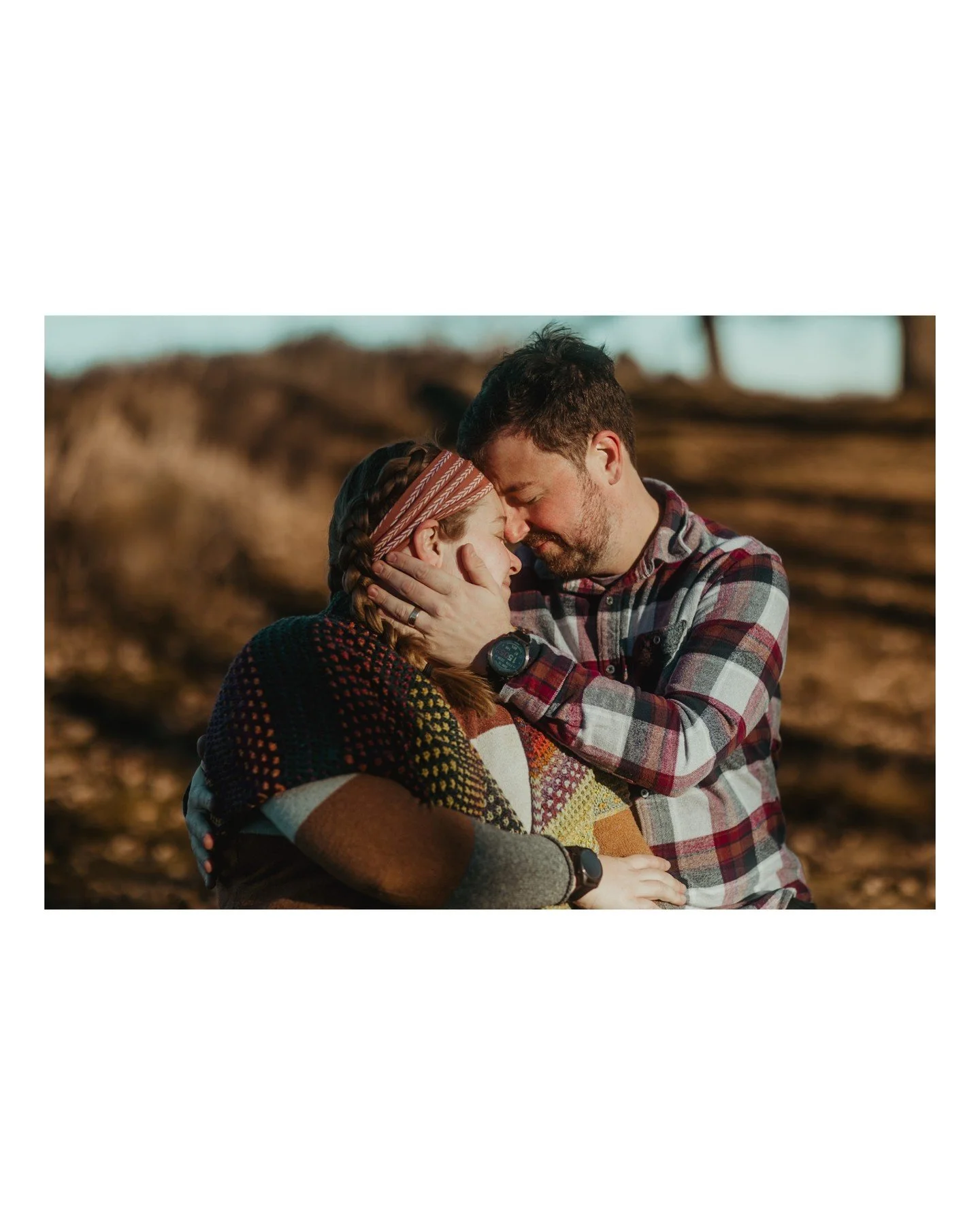 This photo of Cara + Richard though 🥹
.
.
.
.
.
. 
 - Camera Gear: 
 - Canon: @canonusa
 - Accessories: 
 - @polarpro Shortstache Everyday Filter
[Image Description: A pregnant white woman with blonde hair in braids and a bandana wearing a sweater i