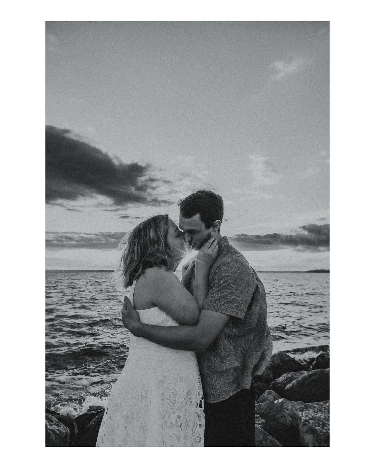 This shot of Mary Alice + Alex near sunset at the Tenney Park pier is 🔥 and I love it so much BUT I can't decide if I like B&amp;W or color better! Which do you prefer? Tell me in the comments! 😍
.
.
.
.
.
.
[Image Description: Two images, both are