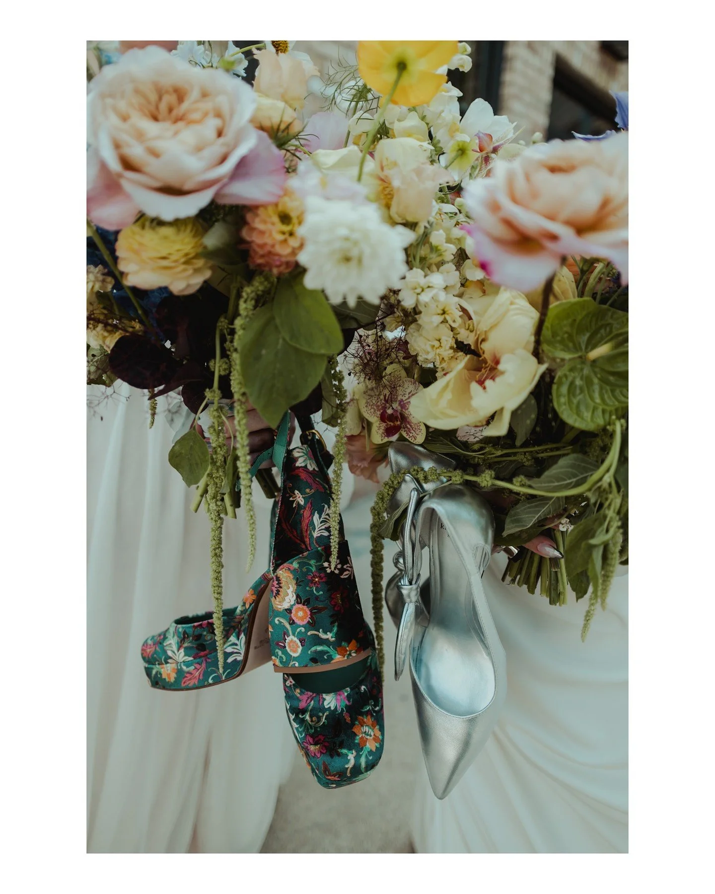 Never underestimate the power of cool shoes on a wedding day (or how great it feels to take them off)!
.
.
.
.
.
.
.
Here are the vendors who helped make this wedding day awesome:
 - Ceremony &amp; Reception Venue: @goodmancenterwi
 - Hair &amp; Make