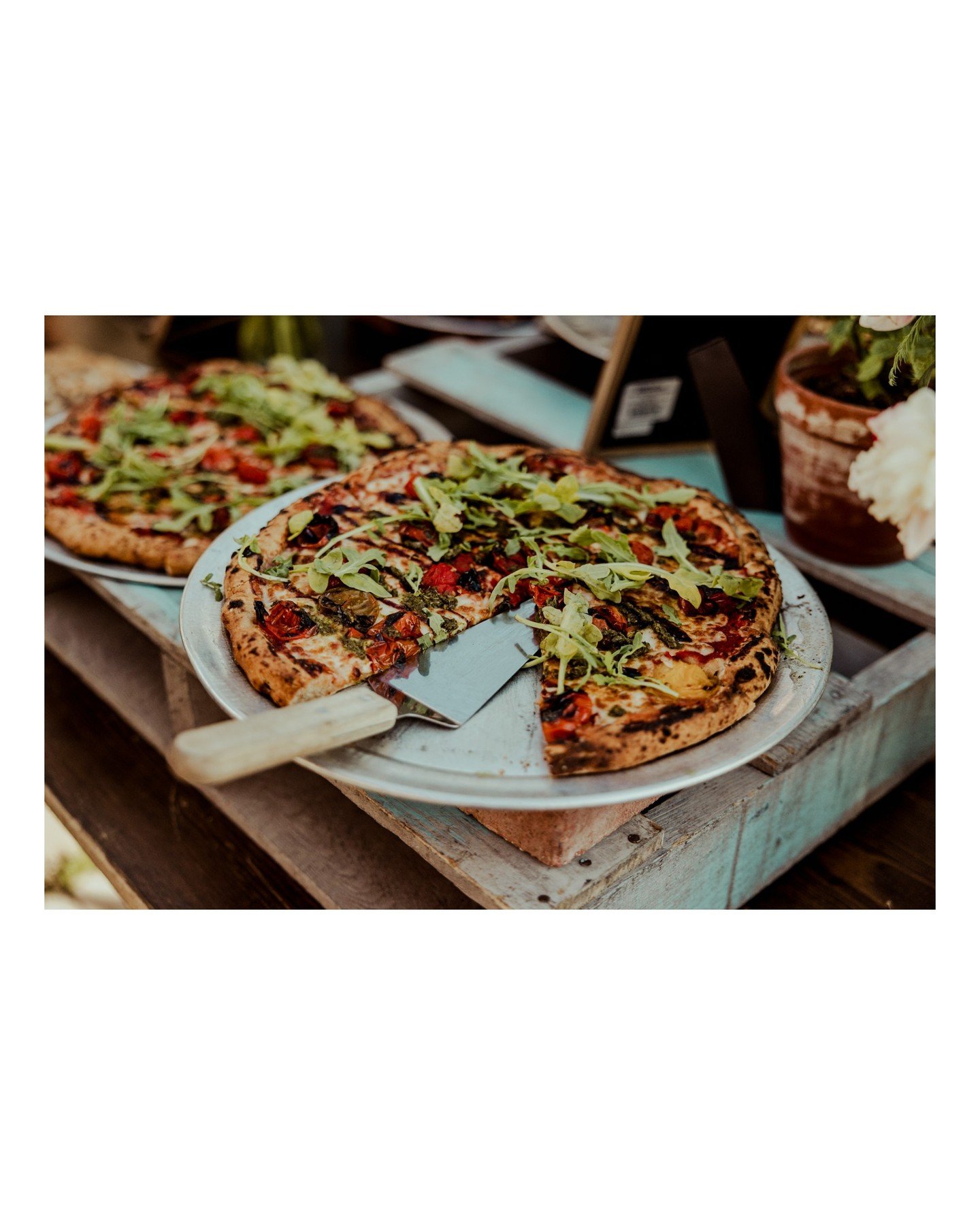 Give your guests what they REALLY want for dinner.... pizza! 
.
.
.
.
.
.
.
Here are the vendors that helped make this wedding day awesome: 
 - Ceremony Venue: @madisonpubliclibrary (Central)
 - Reception Venue: @statelinedistillery
 - Officiant: Pat