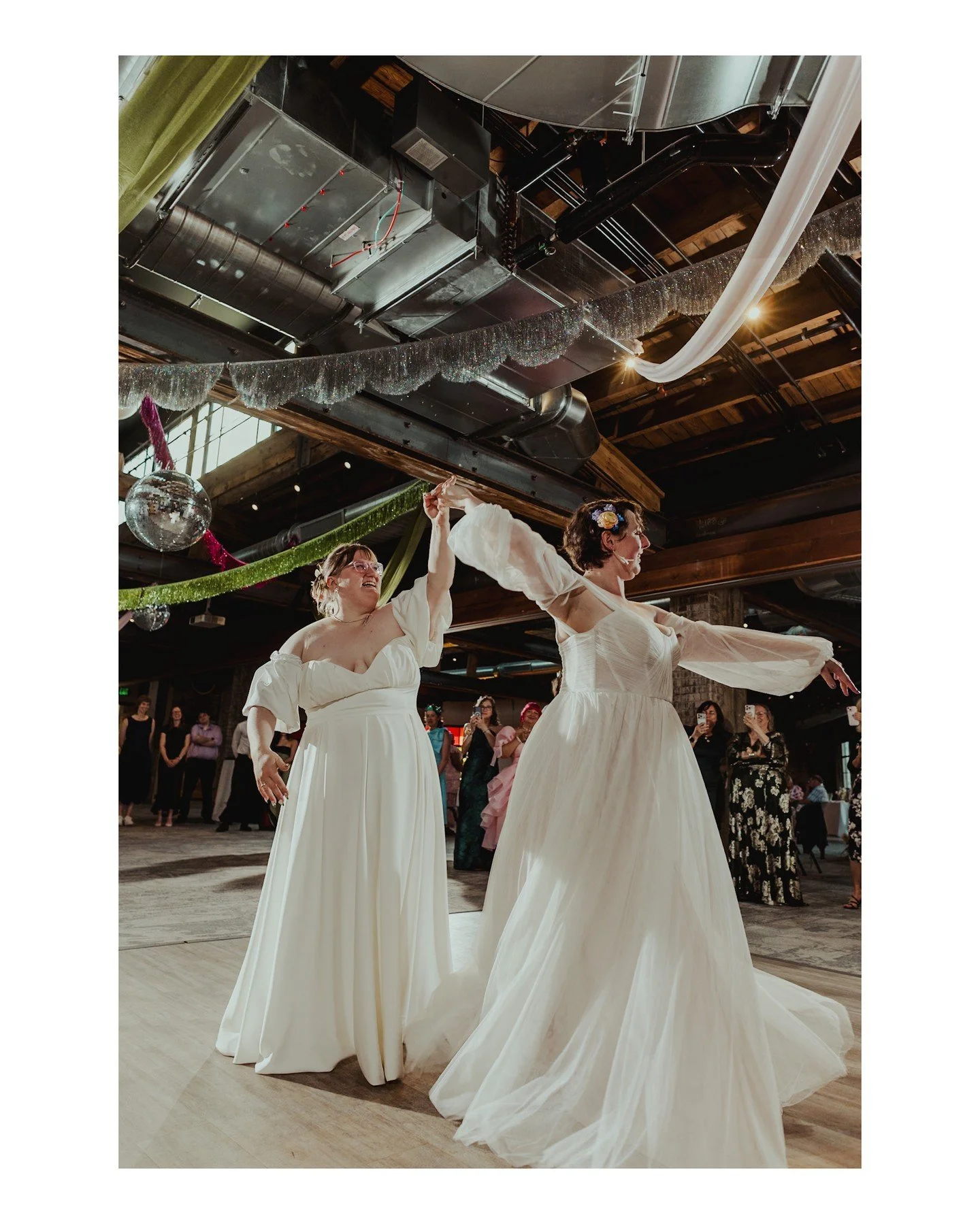 One of my favorite trends in weddings over the last year or so has been all the tinsel, fringe, and pom-pom garlands! I am LOVING it! they photograph so well, add whimsy and glitz on a budget, and pair excellently with disco balls (and who doesn't lo