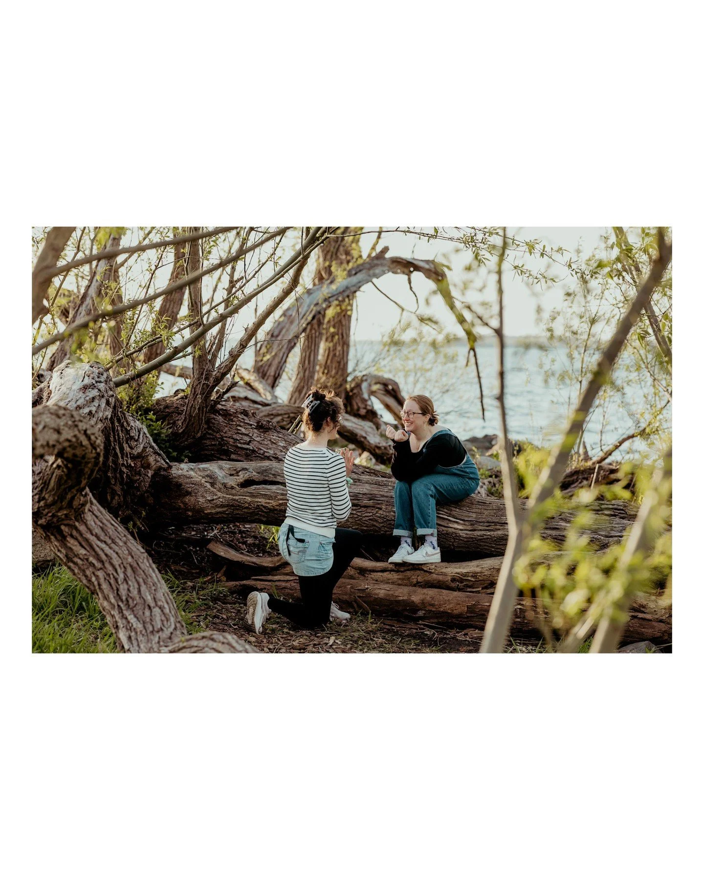 Surprise proposals are the best 🥹 Planning one and not sure how to work in photography? Let's talk! 
.
.
.
.
.
. 
 - Camera Gear: 
 - Canon: @canonusa
 - Accessories: 
 - @polarpro
[Image Description: A white trans woman with dark curly hair, wearin