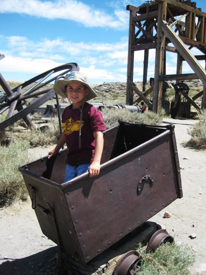 My nephew, Kendall, catching a ride in a gold mining cart at Bodie State Historic Park in California's Eastern Sierra.
