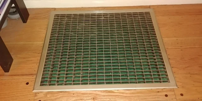 The "new" cold air return register. I painted it champagne mist. 