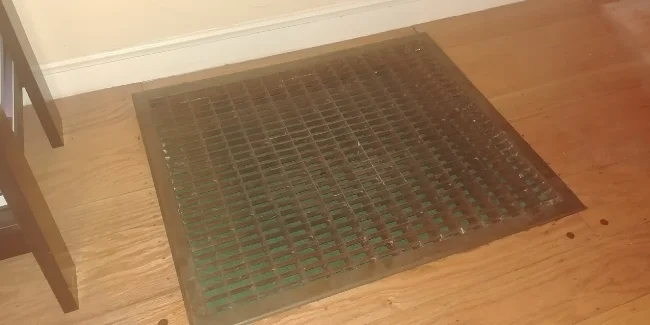Previously, the new cold air return was the old heat vent. It looked awful from years of heat exposure. 