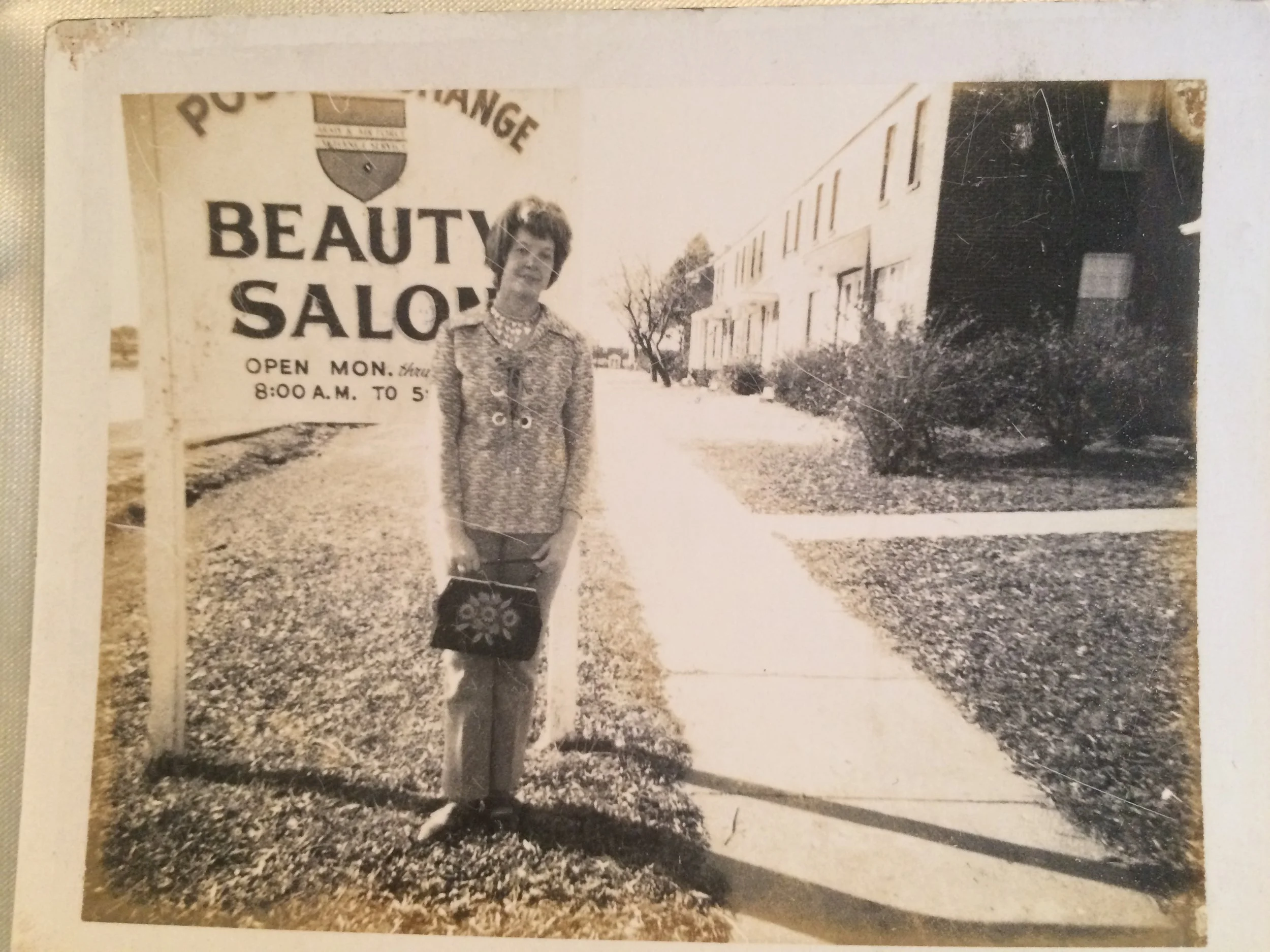 Mom beside one of her beauty shops at Fort Campbell.