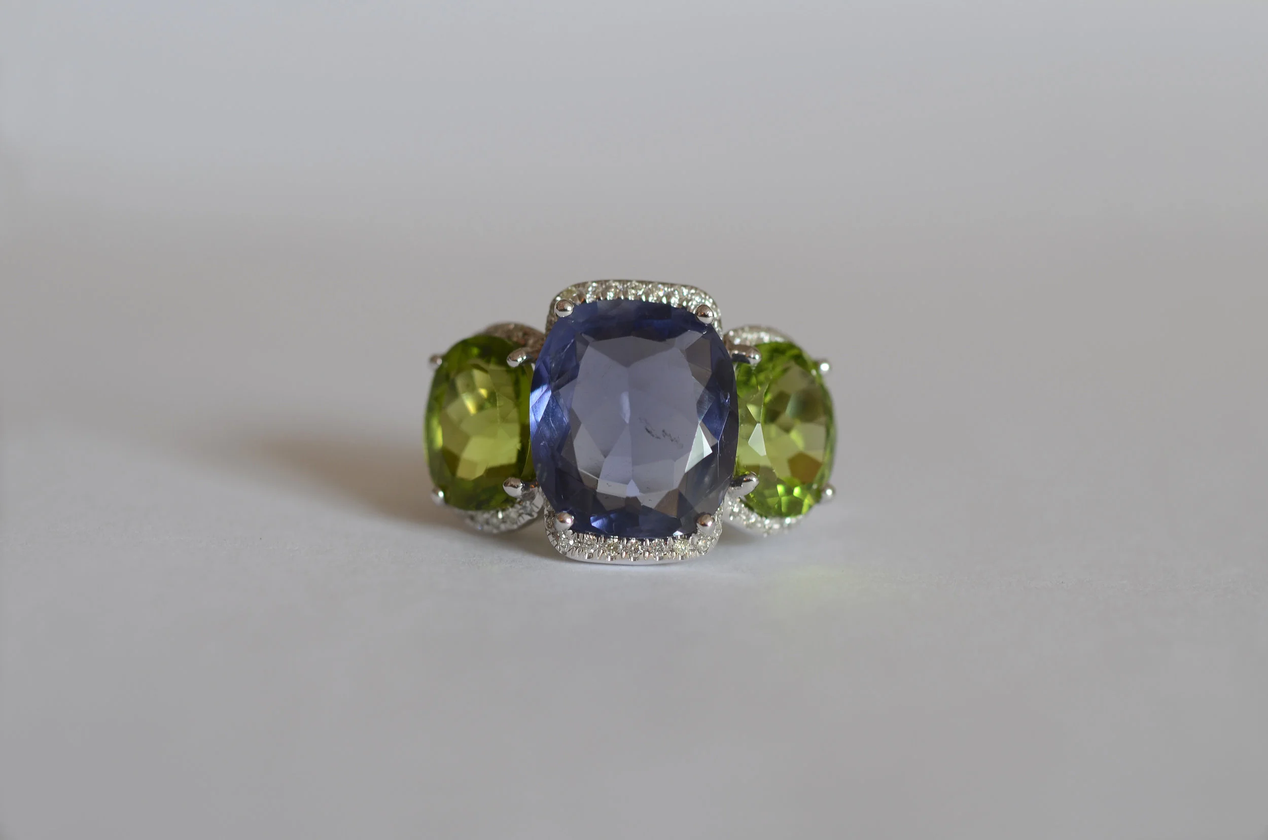 7.47 Carat Iolite and 9.10 Carat Peridot Ring accented with .30 Carat Diamonds set in 18kt White Gold