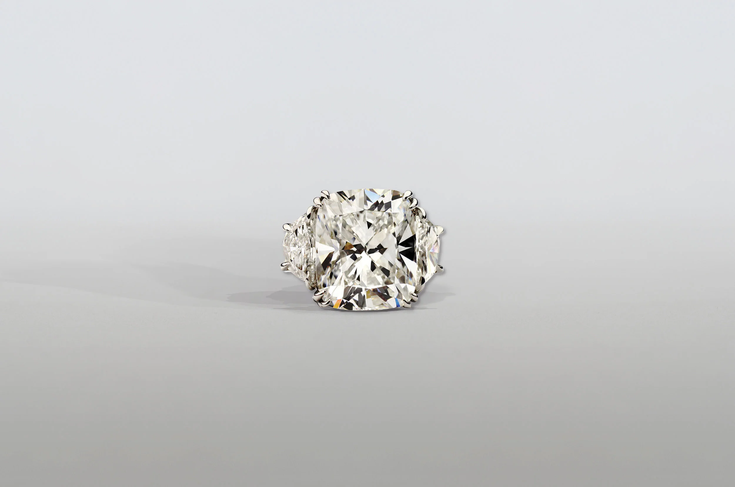 6 Carat Radiant Cushion Diamond Ring with Shield Diamonds set in Platinum