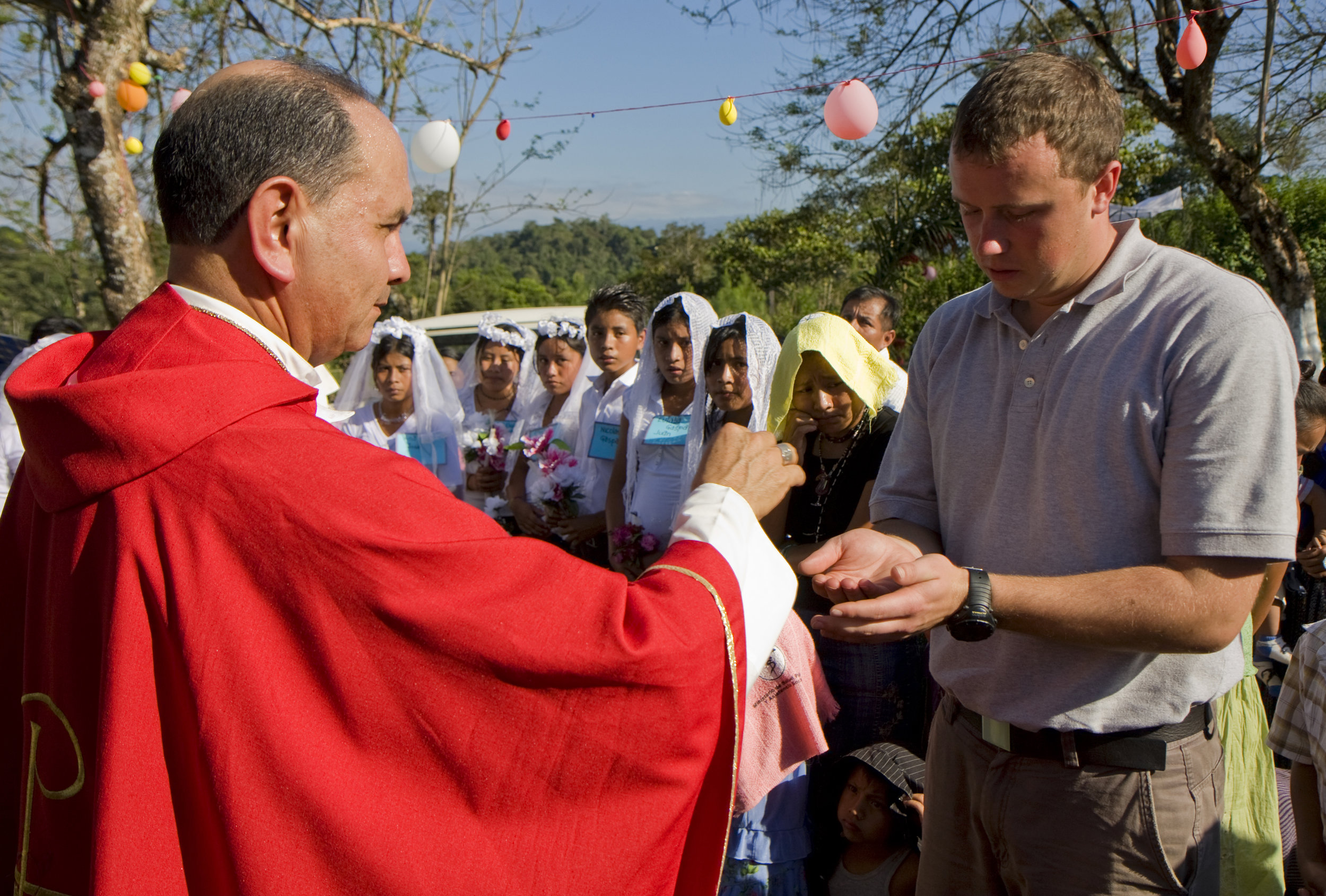 BVC Coban 2009 Pat Deering receiving communion.jpg