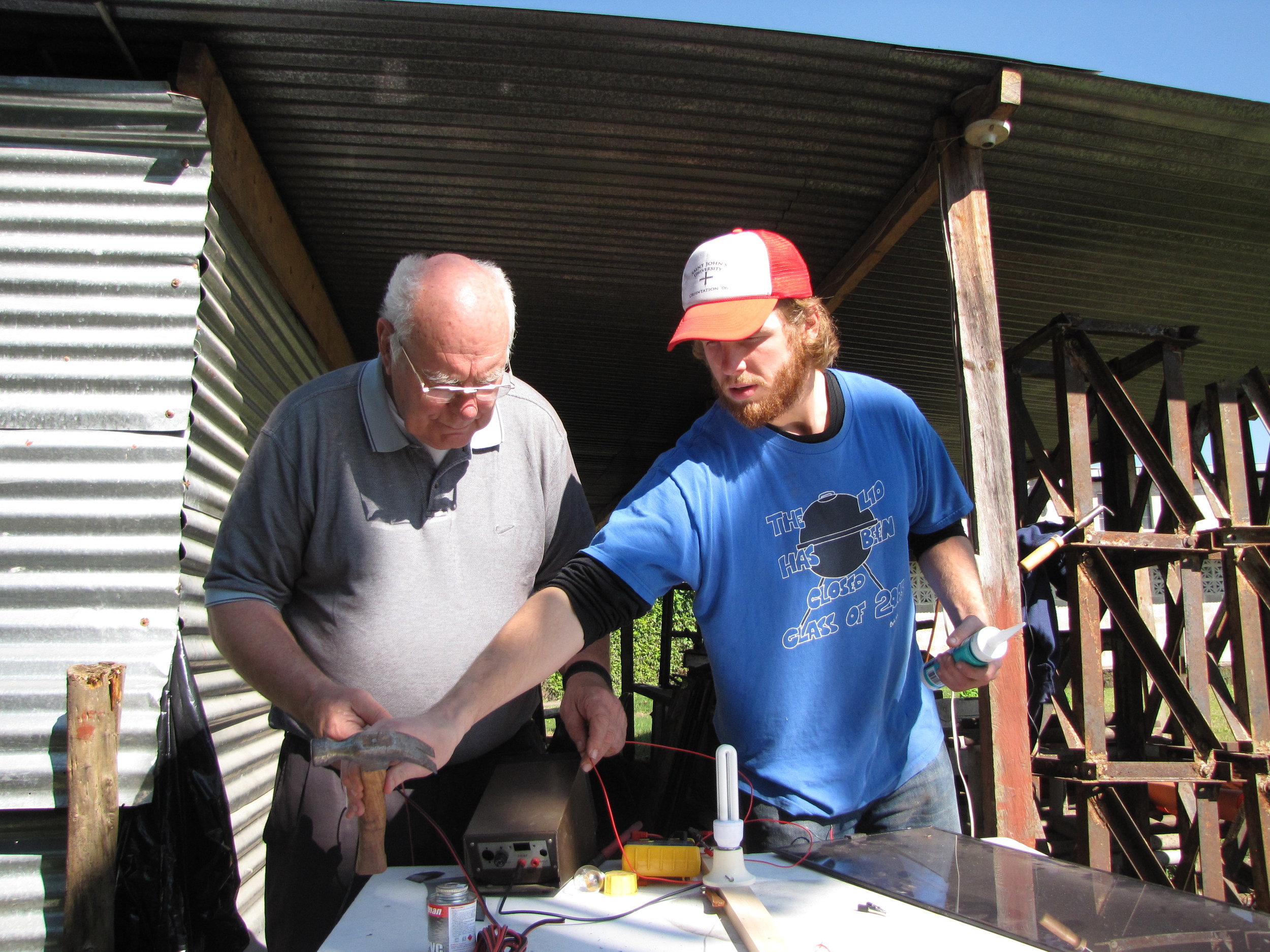 BVC Coban 2010 Connor McIntee with Fr. Bernie.jpg