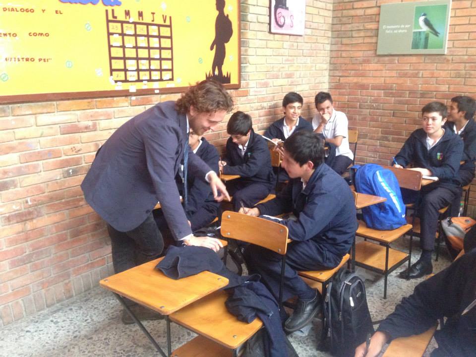 BVC Bogota 2013 Jeremy Robak helping student.jpg