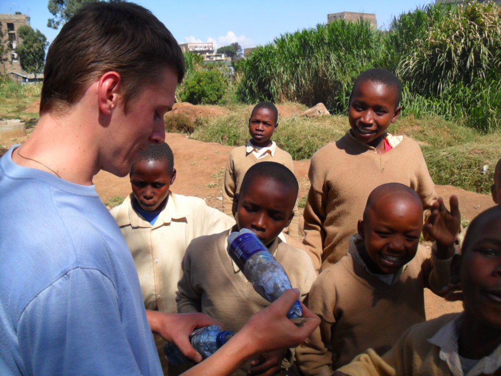 BVC Nairobi 2010 Greg Sullivan showing stuffed bottles.jpg