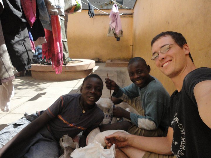 BVC Nairobi 2010 Simon Sperl stuffing bottles with kids.jpg