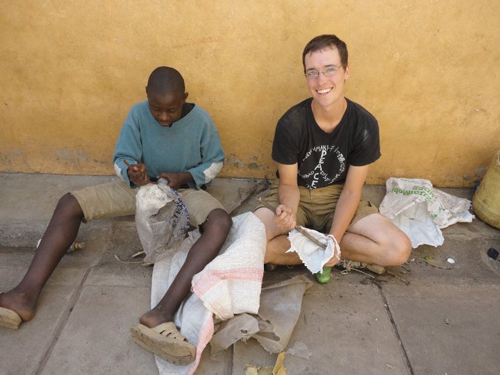 BVC Nairobi 2010 Simon Sperl stuffing with one boy.jpg