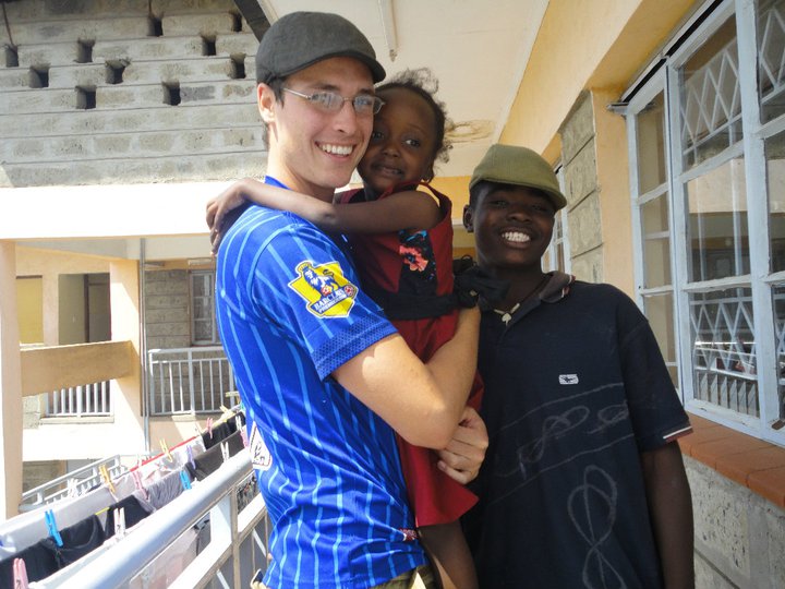 BVC Nairobi 2010 Simon Sperl with kid at St. Benedicts center.jpg