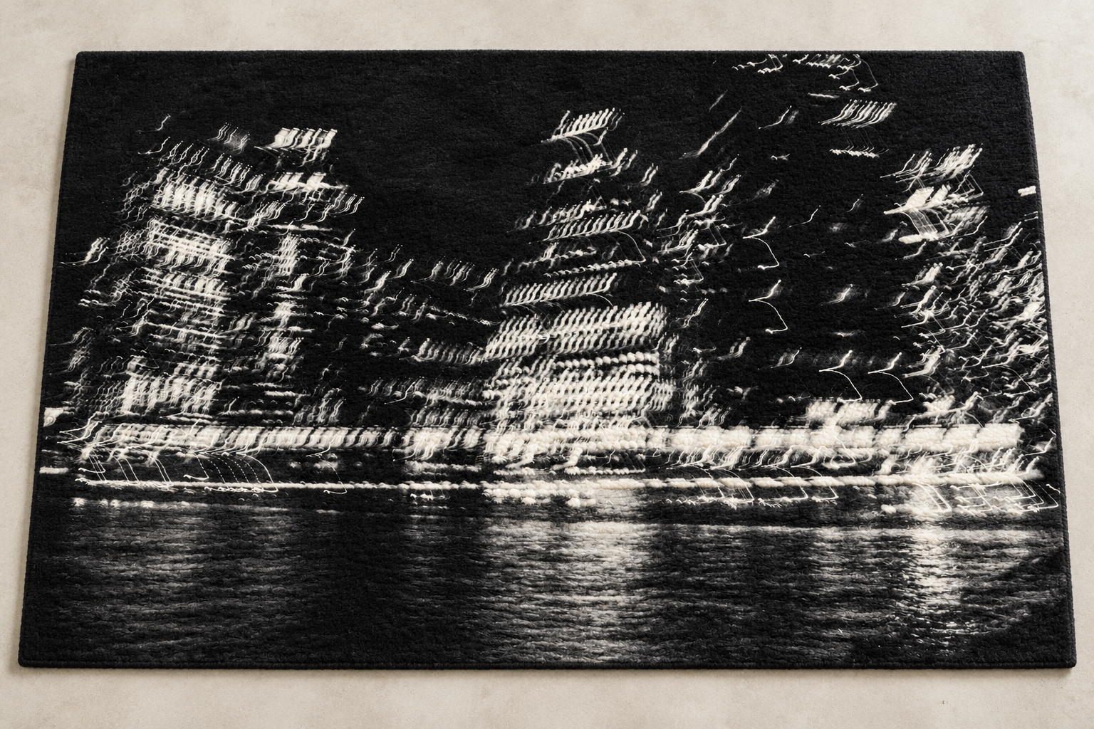 Handtufted black-and-white waterfront art rug.png