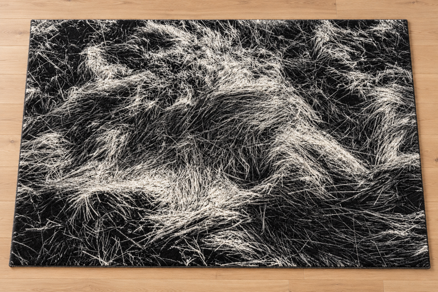 Handtufted organic black and ivory wool rug.png