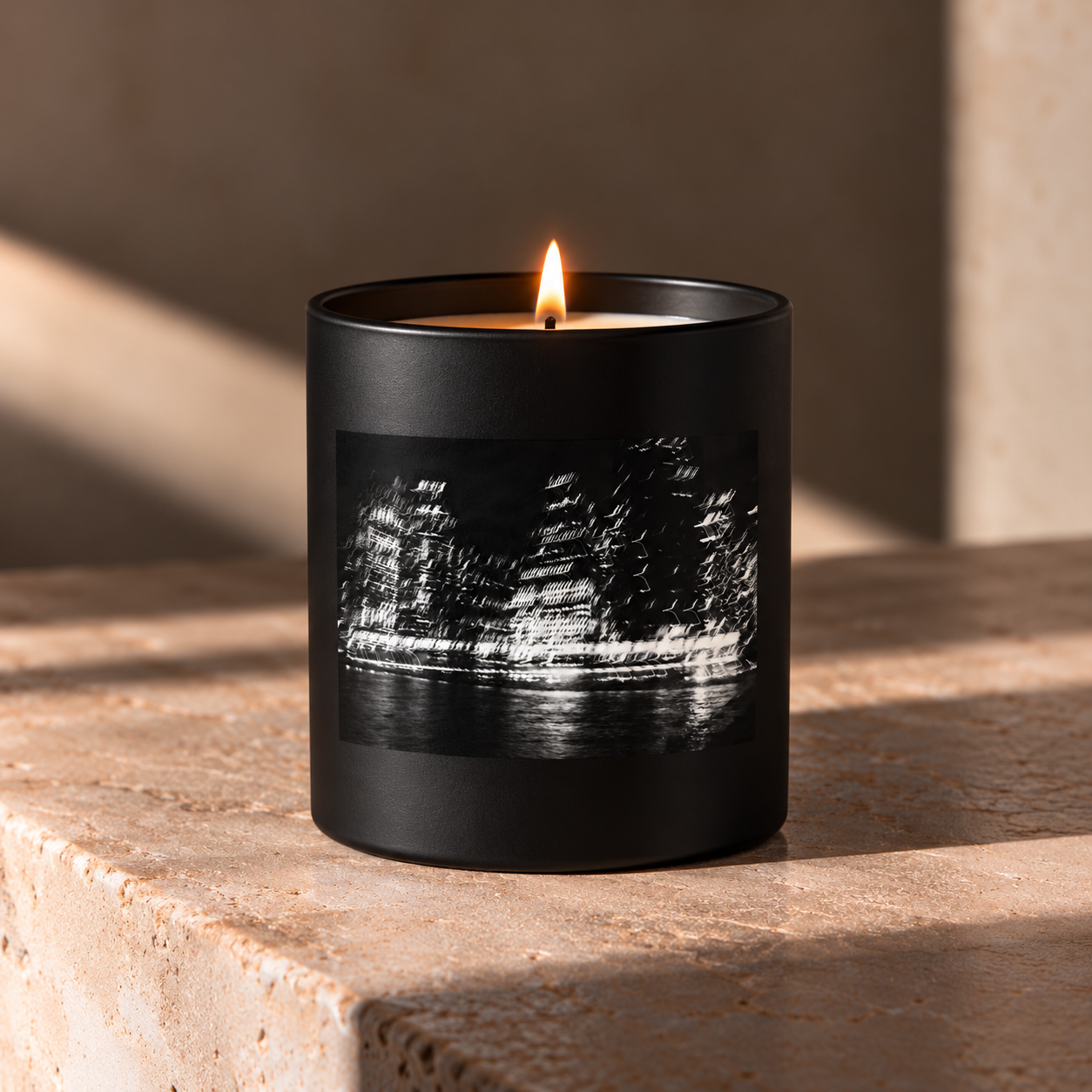 Moody Black Candle with Cityscape Label.png