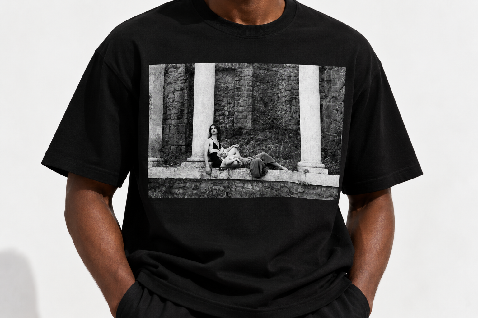 Black Graphic Tee with Stone Columns.png
