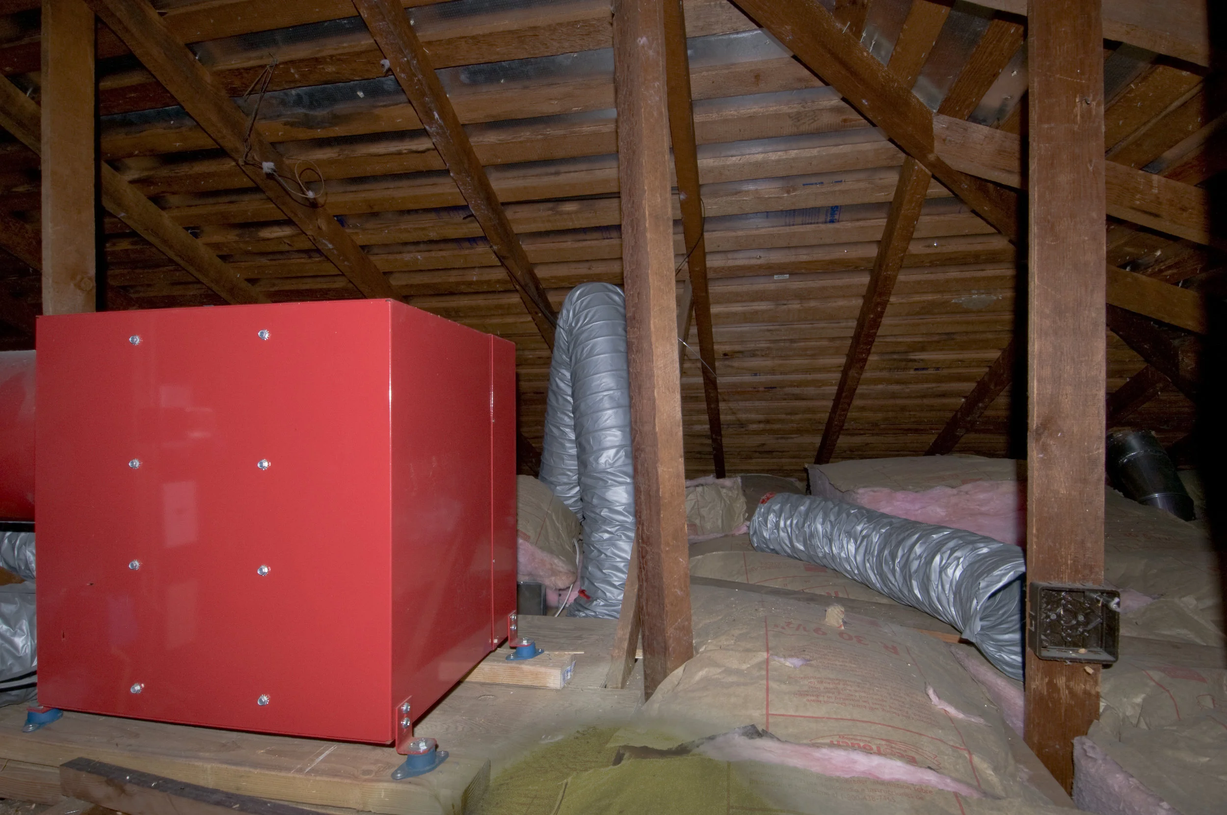 Whole House Fan in attic to provide mechanical assistance to this naturally ventilated house with no air conditioning