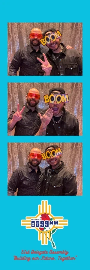 Guests using props at an Albuquerque photo booth