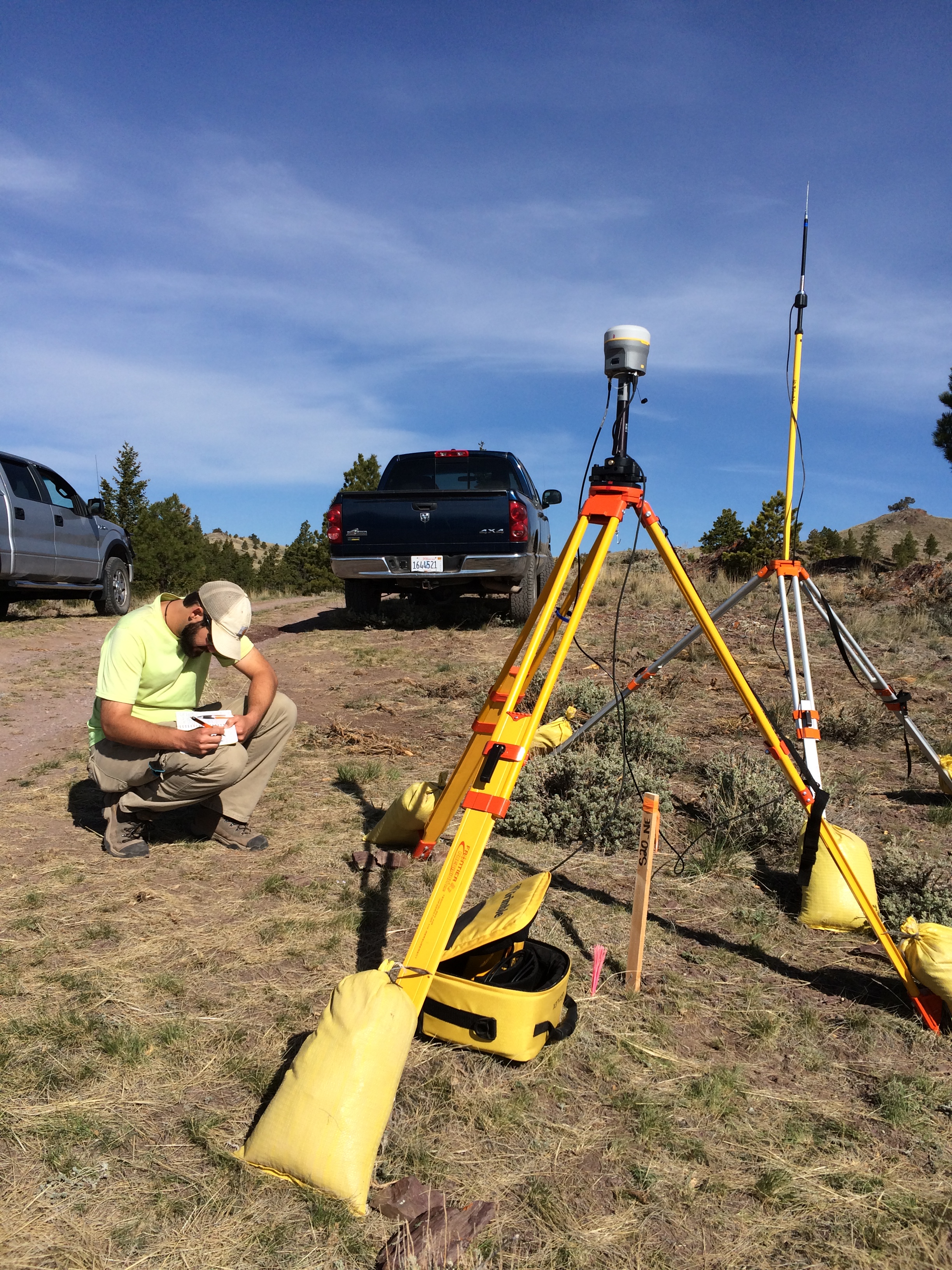 Scott sets up the Trimble R10 base station and repeater for accurate GPS position control.