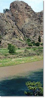 Silty spring runoff from the Dearborn River enters the Missouri River in the Adel Mountains near Craig, MT.