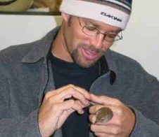 Image of Adrian Wolf holding a bird